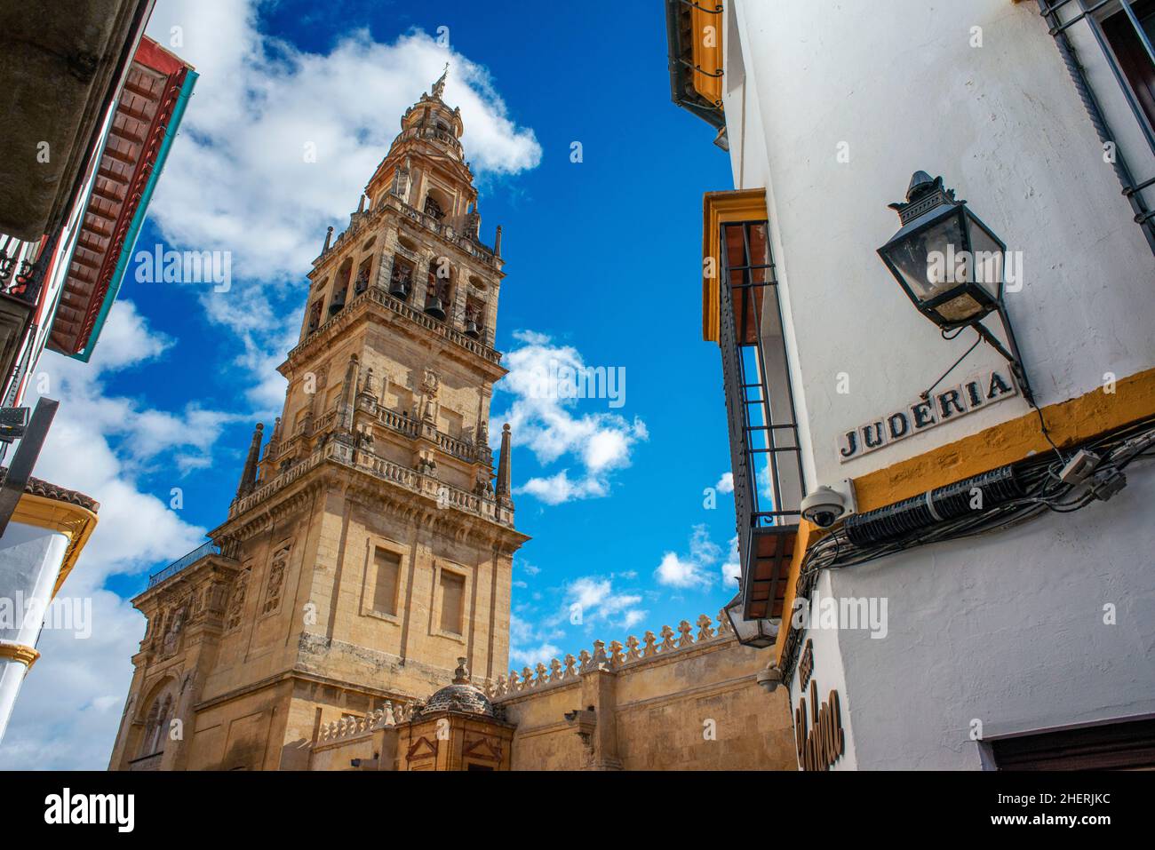Shops bars and restaurants outside the La Mezquita Cathedral Mosque in the historic old town La Juderia, Cordoba, Andalucia, Spain.  Dance and celebra Stock Photo