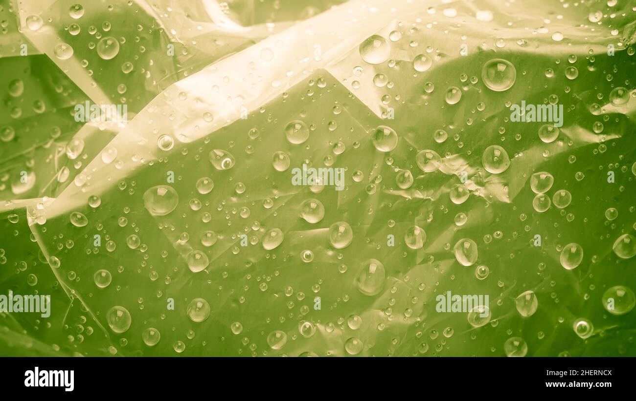 Abstract green water drops. Macro shooting background Stock Photo - Alamy