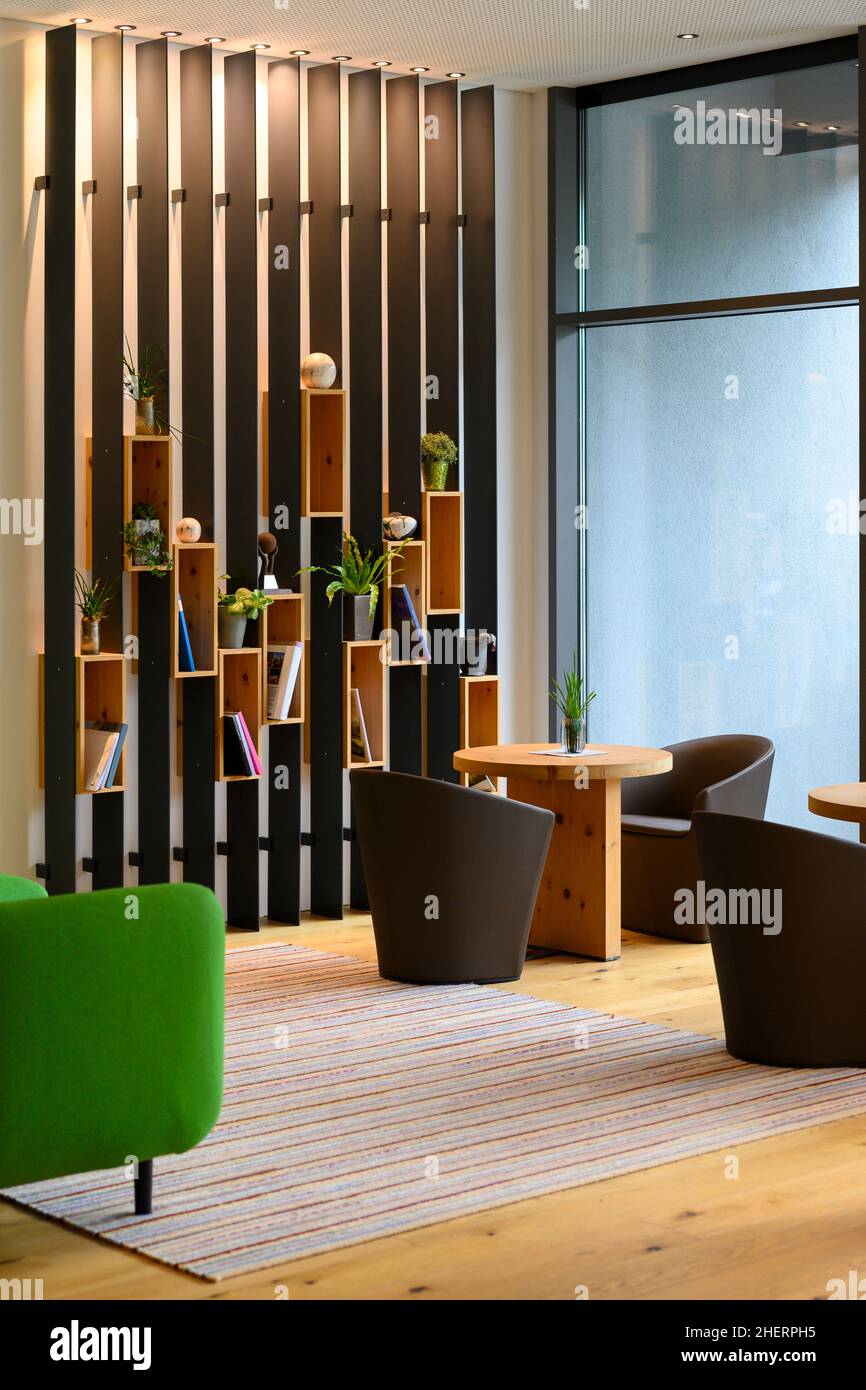 vertical metal shelf plant and book decoration on wooden boards boxes
