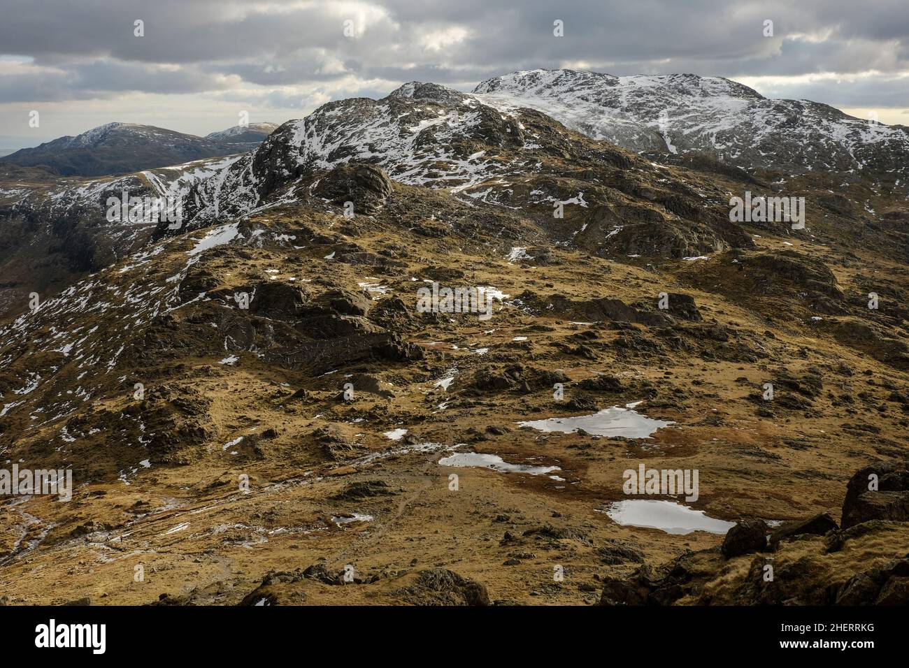 The Three Tarns and Crinkle Crags from Bowfell, The Lake District, England Stock Photo