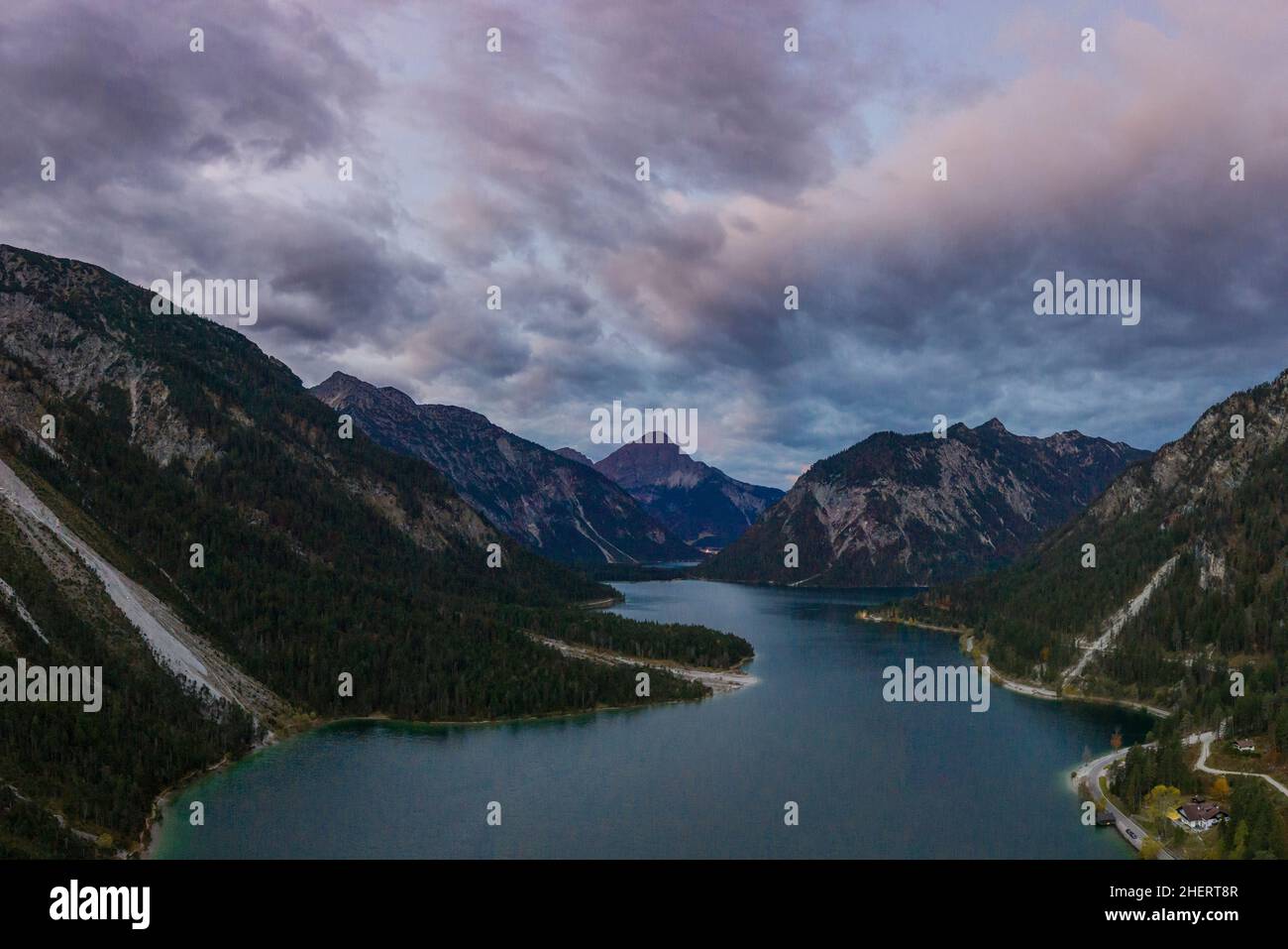 aerial view of dramatic cloudy sky over lake plansee at fall Stock ...