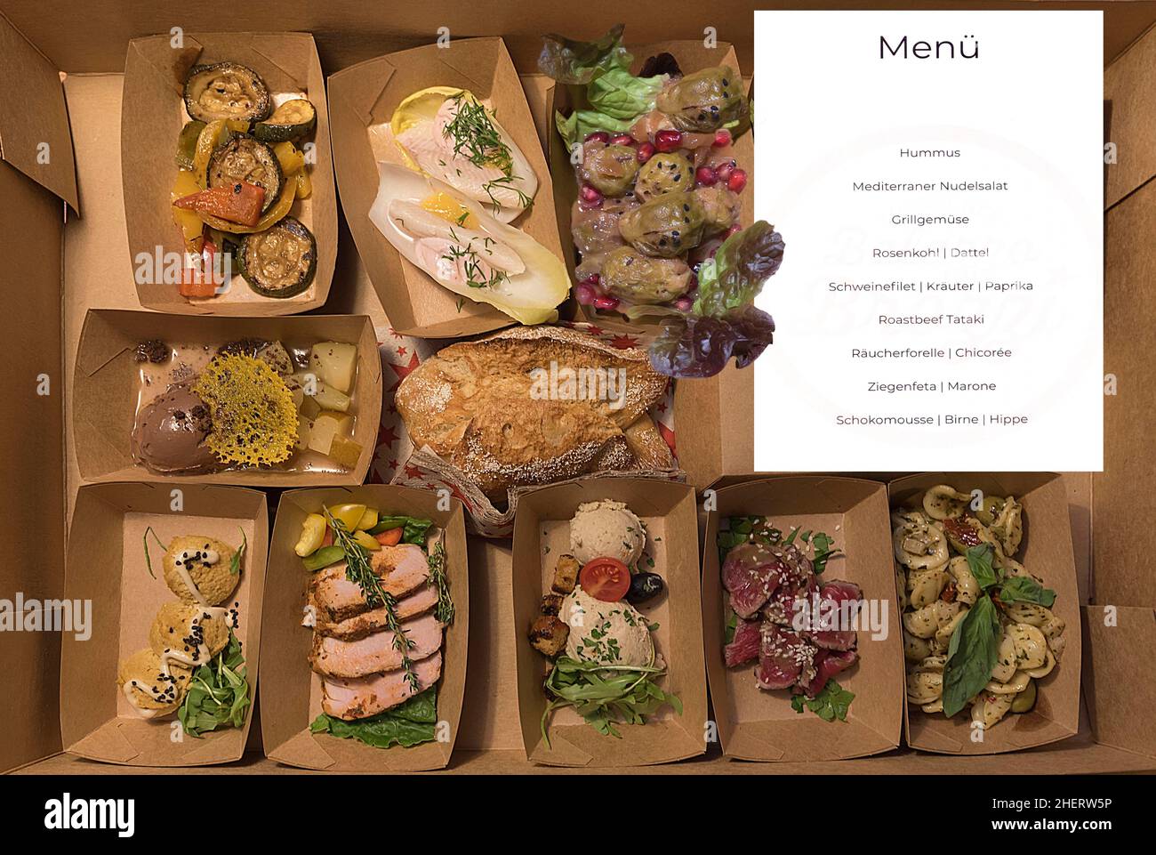 Online ordered menu with meat and vegetables delivered in boxes