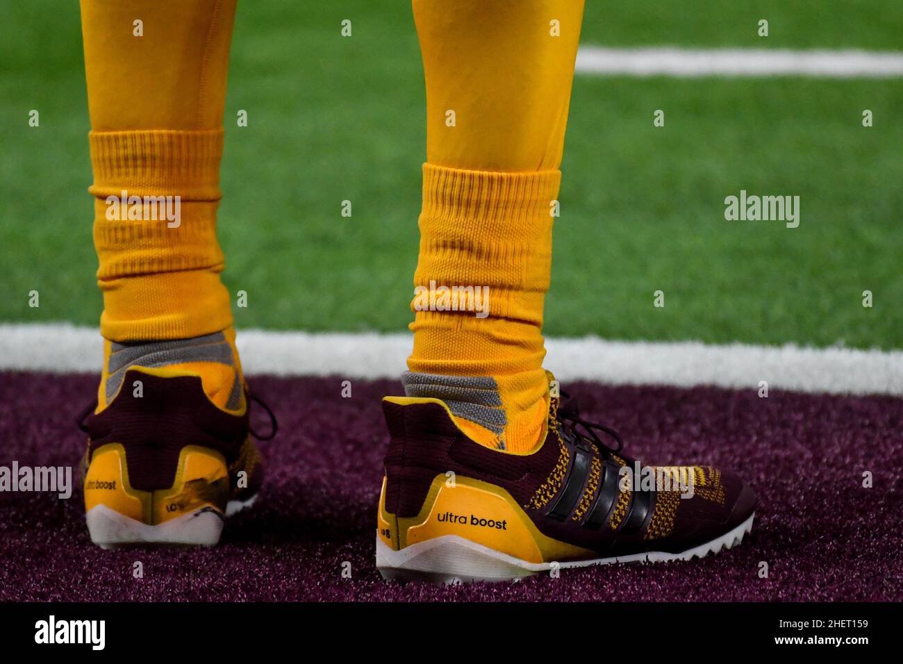 Detailed view of the Adidas Ultra Boost ASU cleats worn by Arizona State Sun Devils quarterback Jayden Daniels (5) during the Las Vegas Bowl game agai Stock Photo