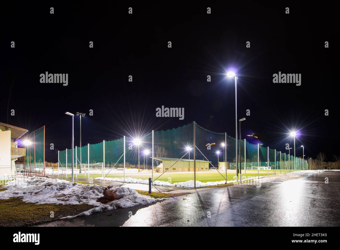 training soccer field with flood light at night in winter Stock Photo