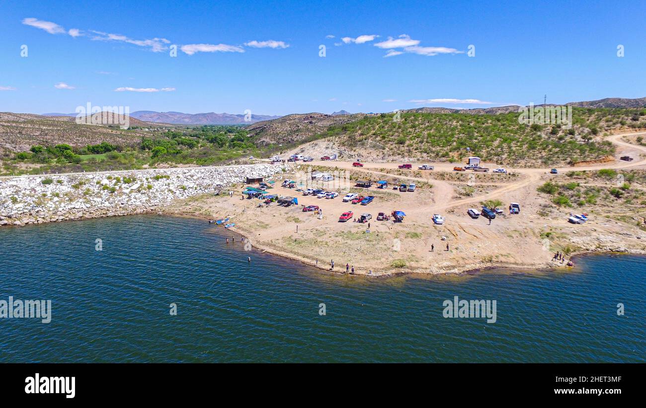 Aerial view of the Jacinto Lopez dam in the Fronteras Sonora region. Fronteras is a town in the Mexican state of Sonora, located northeast of the state. The region where the town of Fronteras is today was inhabited by indigenous Opatas since before the arrival of the Spanish colonizers, in 1645 priests of the Society of Jesus arrived in the area with the intention of evangelizing the indigenous peoples, founding for This is the mission that today is Fronteras with the name of Santa Rosa de Corodéhuachi. (Photo: Norberto Corral / NortePhoto)   Vista Aérea de la presa Jacinto Lopez en la region Stock Photo