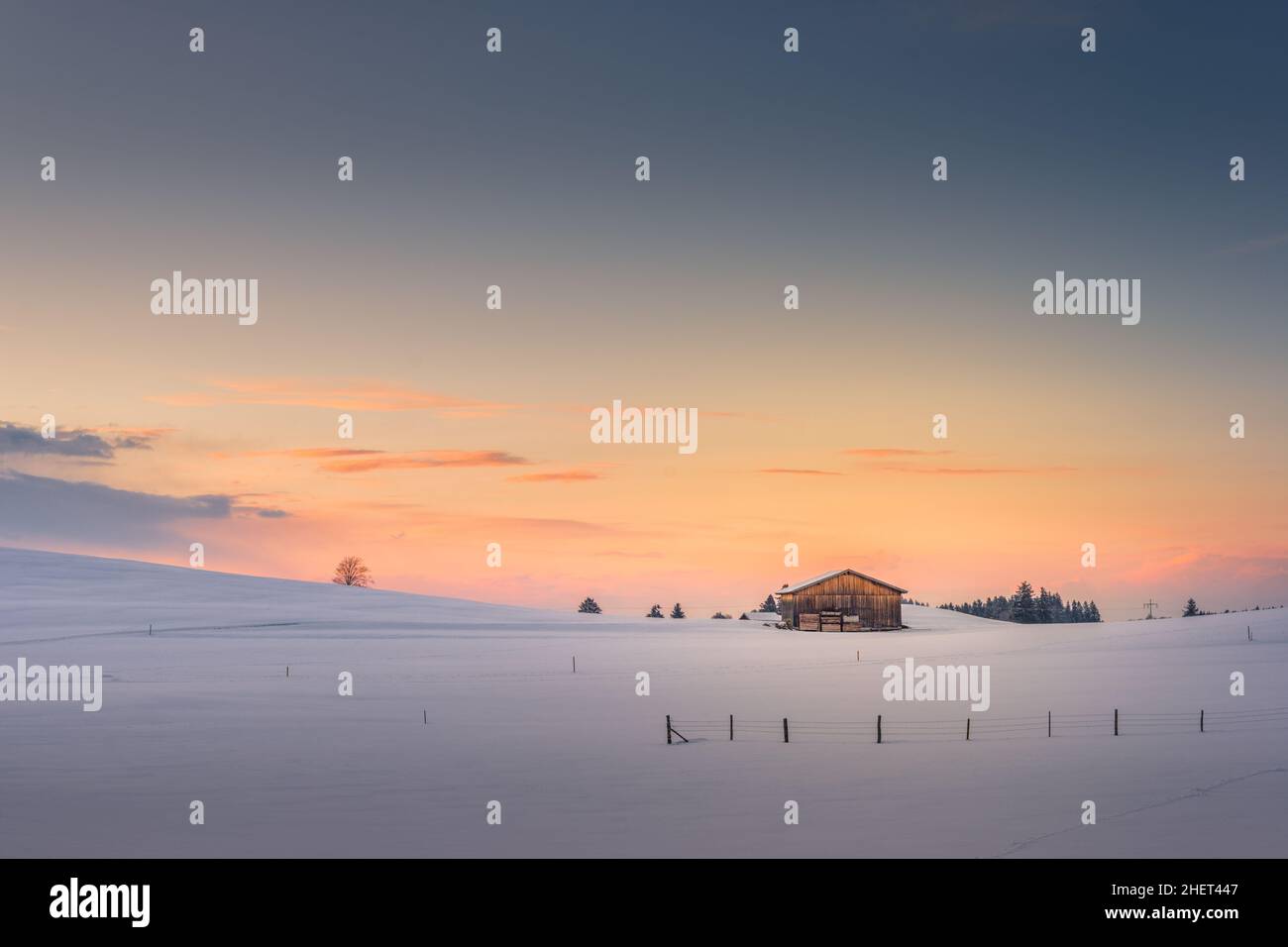 single hut at afterglow sunset sky in winter Stock Photo