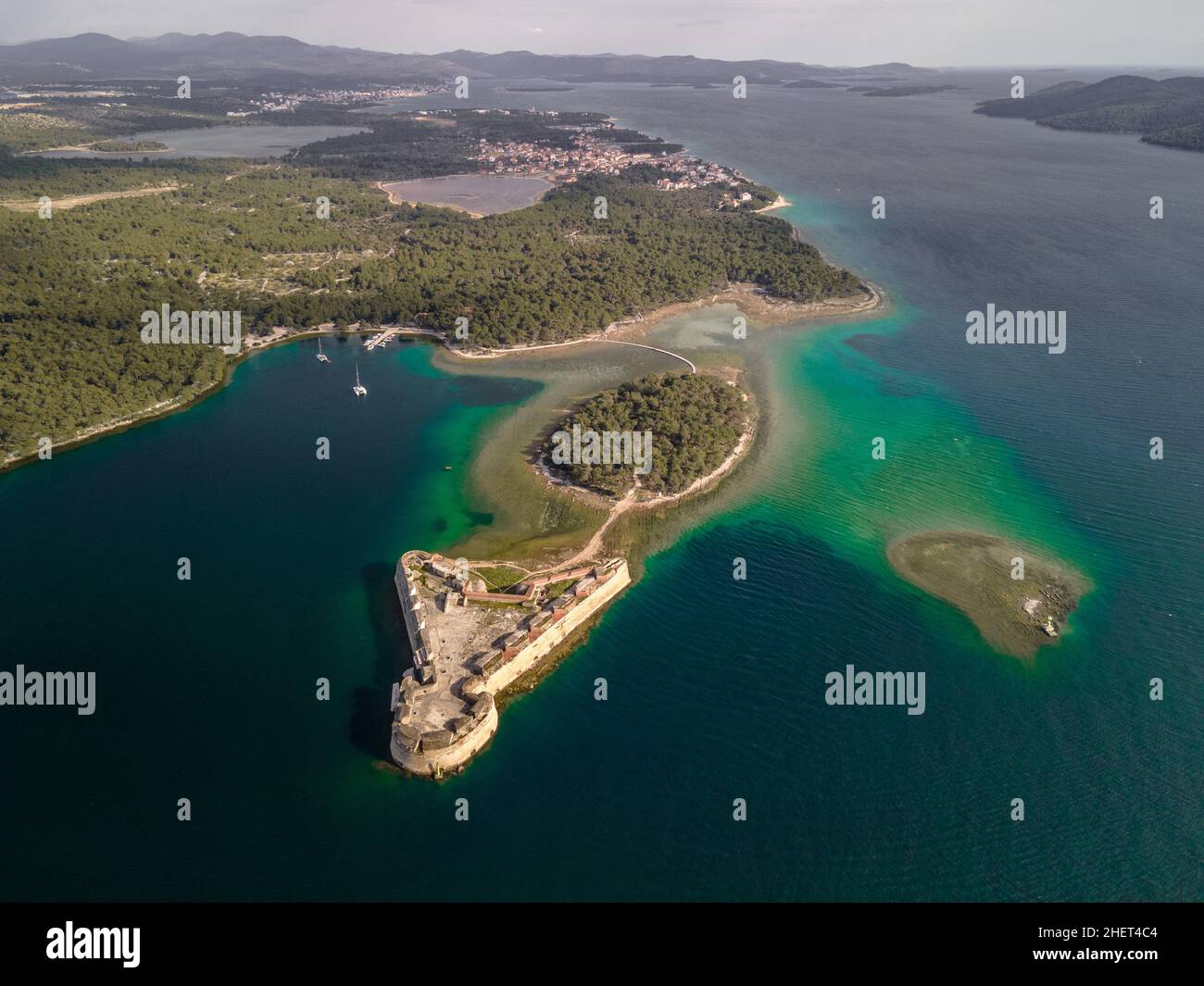 Aerial shot of colorful reef of St. Nicholas Fortress - Sibenik archipelago, Croatia Stock Photo