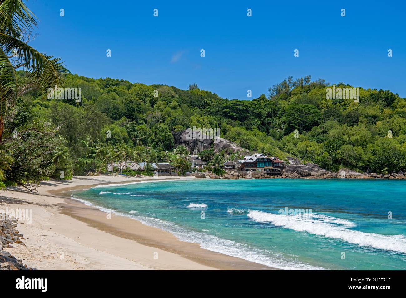 Waterfront hotel and restaurants  Anse a La Mouche West Coast Mahe Island Seychelles Stock Photo