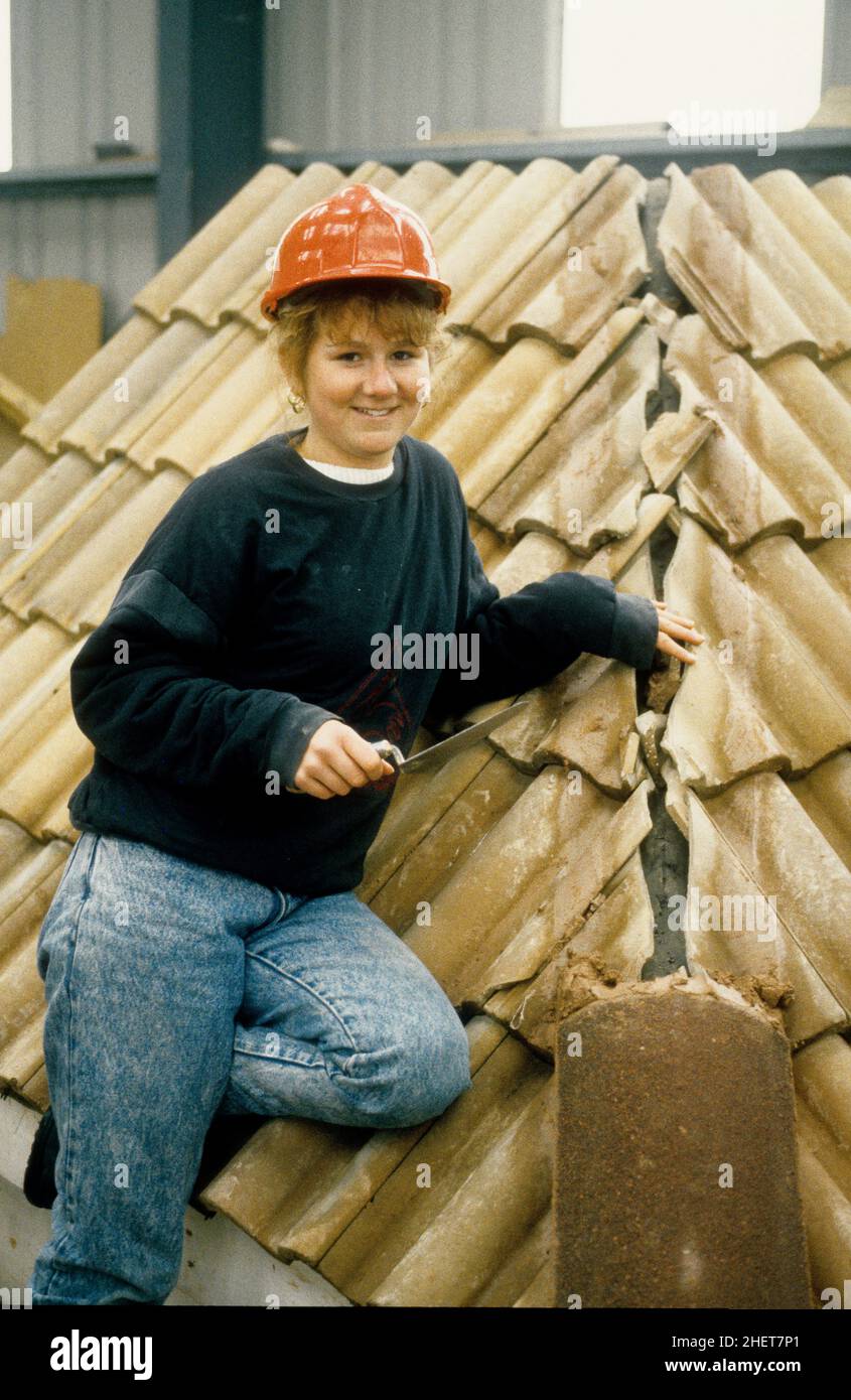 Training to a roofer Tracy Loak beleived to be the first woman