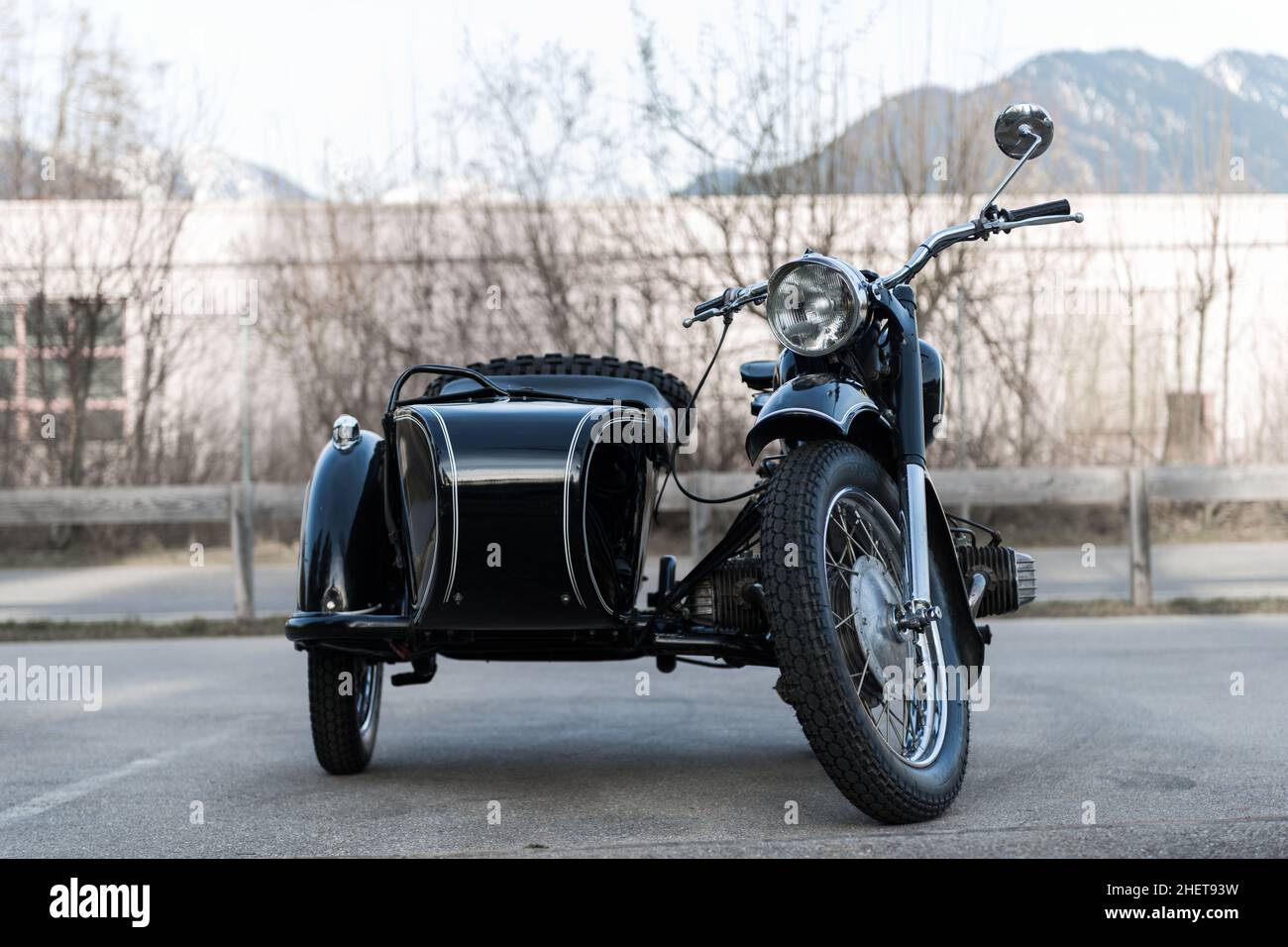 frontview of black old  oldtimer motorcycle with sidecar Stock Photo