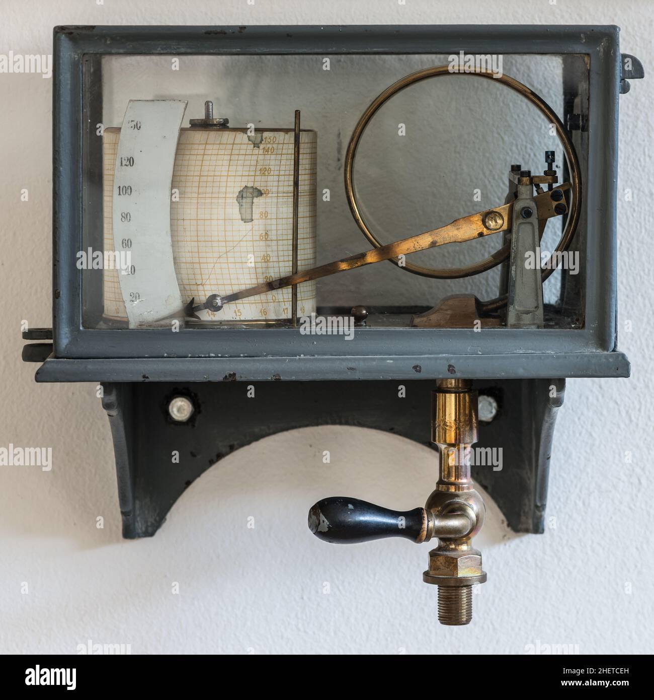 old retro hygrometer weather station at wall Stock Photo