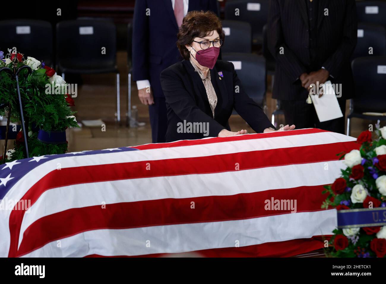 Washington, DC. 12th Jan, 2022. WASHINGTON, DC - JANUARY 12: Sen. Jacky Rosen (D-NV) places her hands on the flag-draped casket of former Senate Majority Leader Harry Reid as he lies in state in the U.S. Capitol Rotunda on January 12, 2022 in Washington, DC. A Democrat, Reid represented Nevada in Congress for more than 30 years, eight as the Senate majority leader. Credit: Chip Somodevilla/Pool via CNP/dpa/Alamy Live News Stock Photo