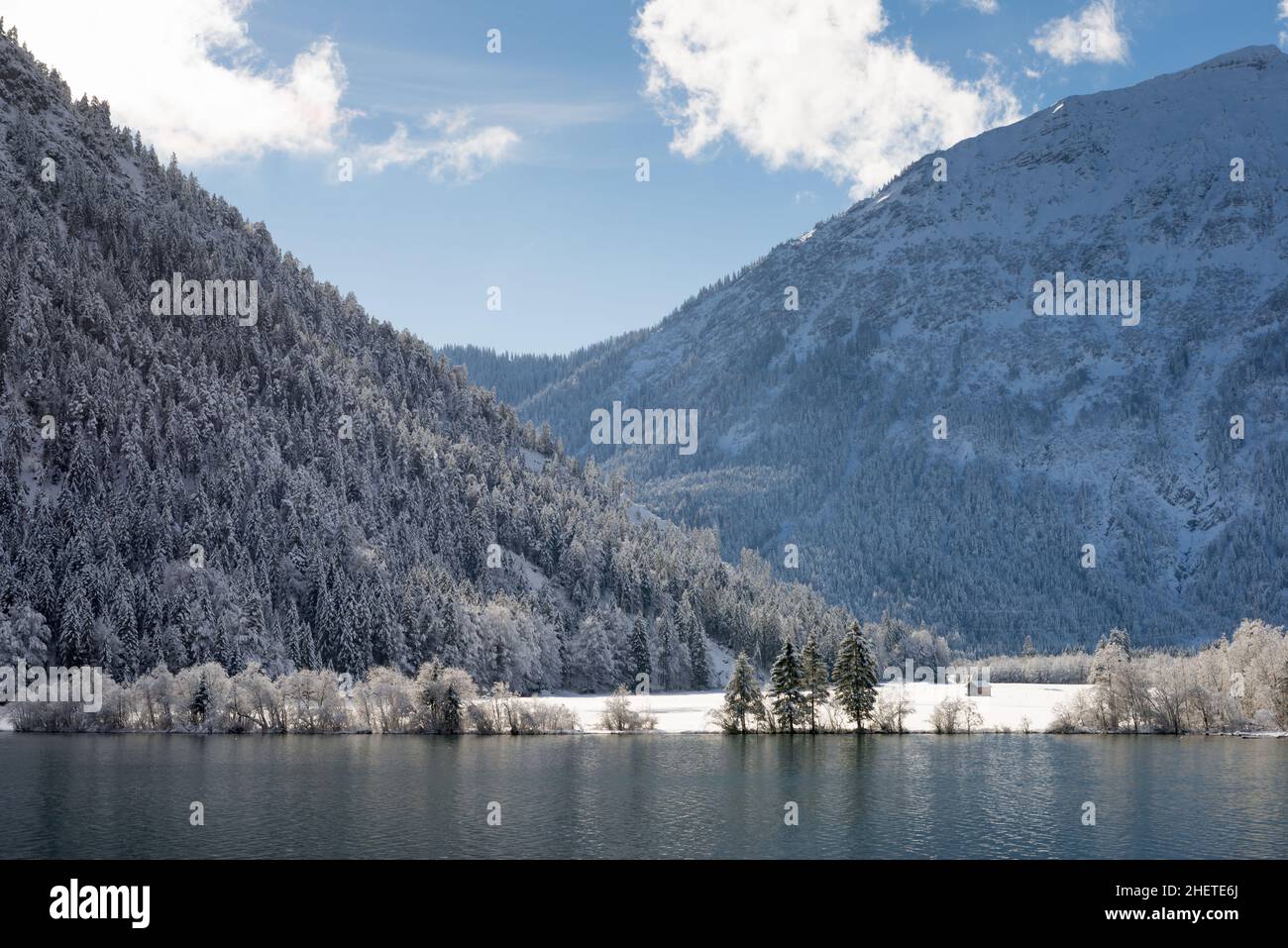 blue cloudy sky with wonderful winter landscape at lake Stock Photo - Alamy