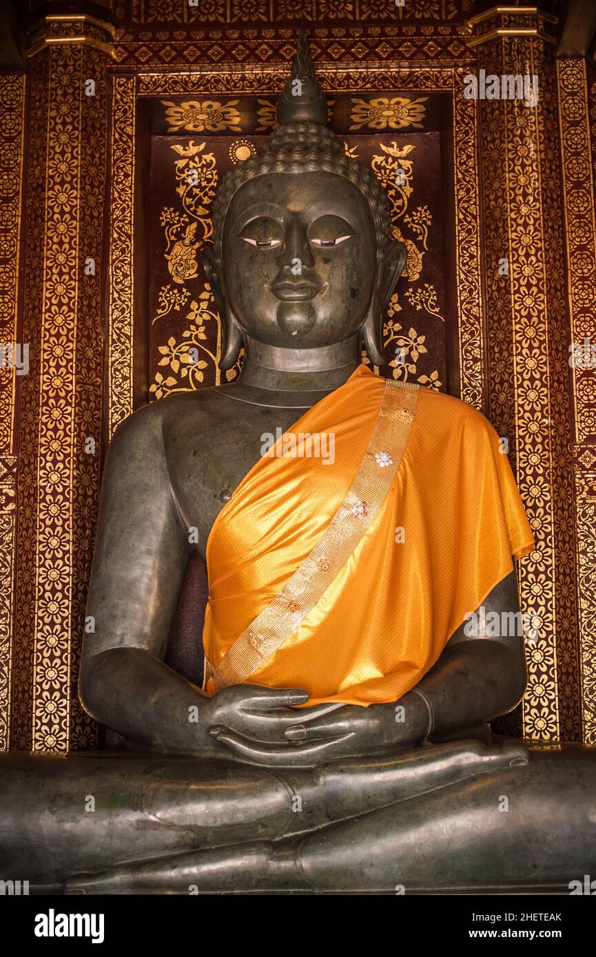 Buddha statue at Buddhist temple in Chiang Mai, Northern Thailand Province. Buddhism art and