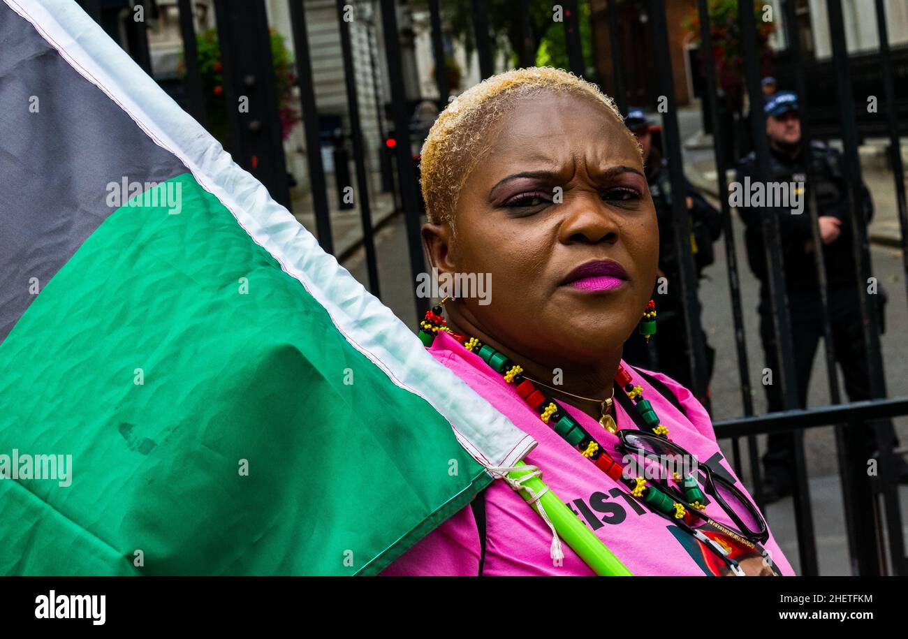 Biafran protestor in Westminster London calls for Boris Johnson (British PM) to intervene in detention of Nnamdi Kanu IPOB leader / British Citizen Stock Photo