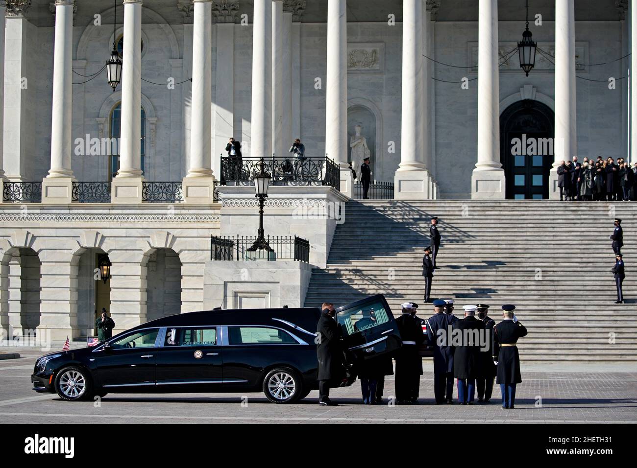 The casket of late Senator Harry Reid, bottom center, arrives to the U.S. Capitol before a ceremony in Washington, DC, U.S., on Wednesday, Jan. 12, 2022. Reid, the Democratic U.S. Senate majority leader who helped implement President Obama's legislative agenda by rounding up votes to pass Obamacare, died at 82 on Dec. 28. Credit: Al Drago /Pool via CNP /MediaPunch Stock Photo
