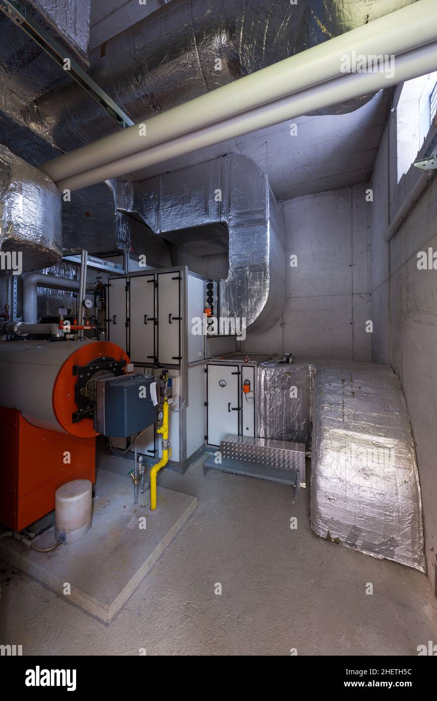 engineering and plant room with thermally insulated pipes Stock Photo