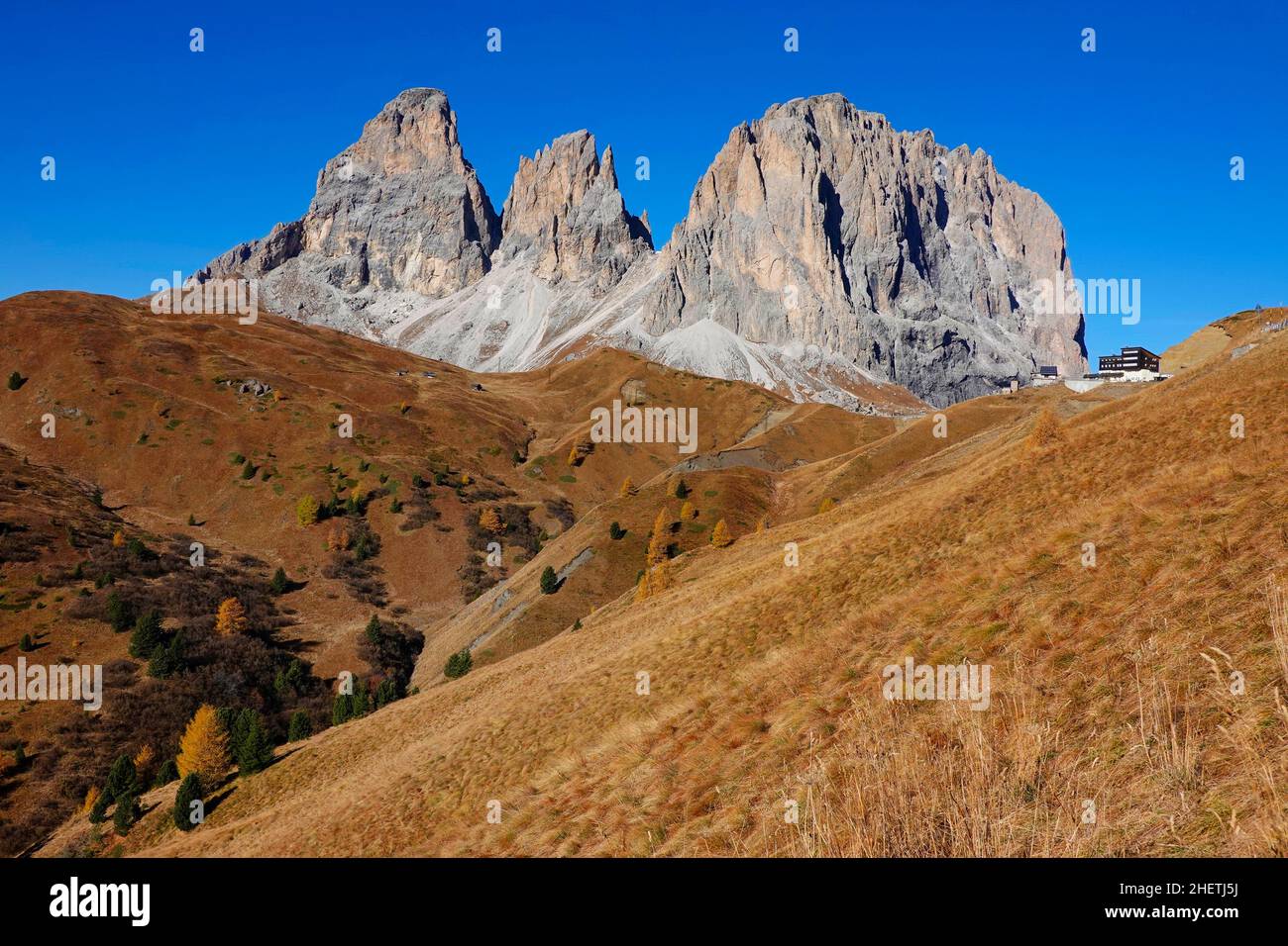 View of Sella Joch pass and mounts Langkofel, Plattkofel, Sassopiatto, Sassolungo, South Tirol, Dolomites mountains, Italy Stock Photo