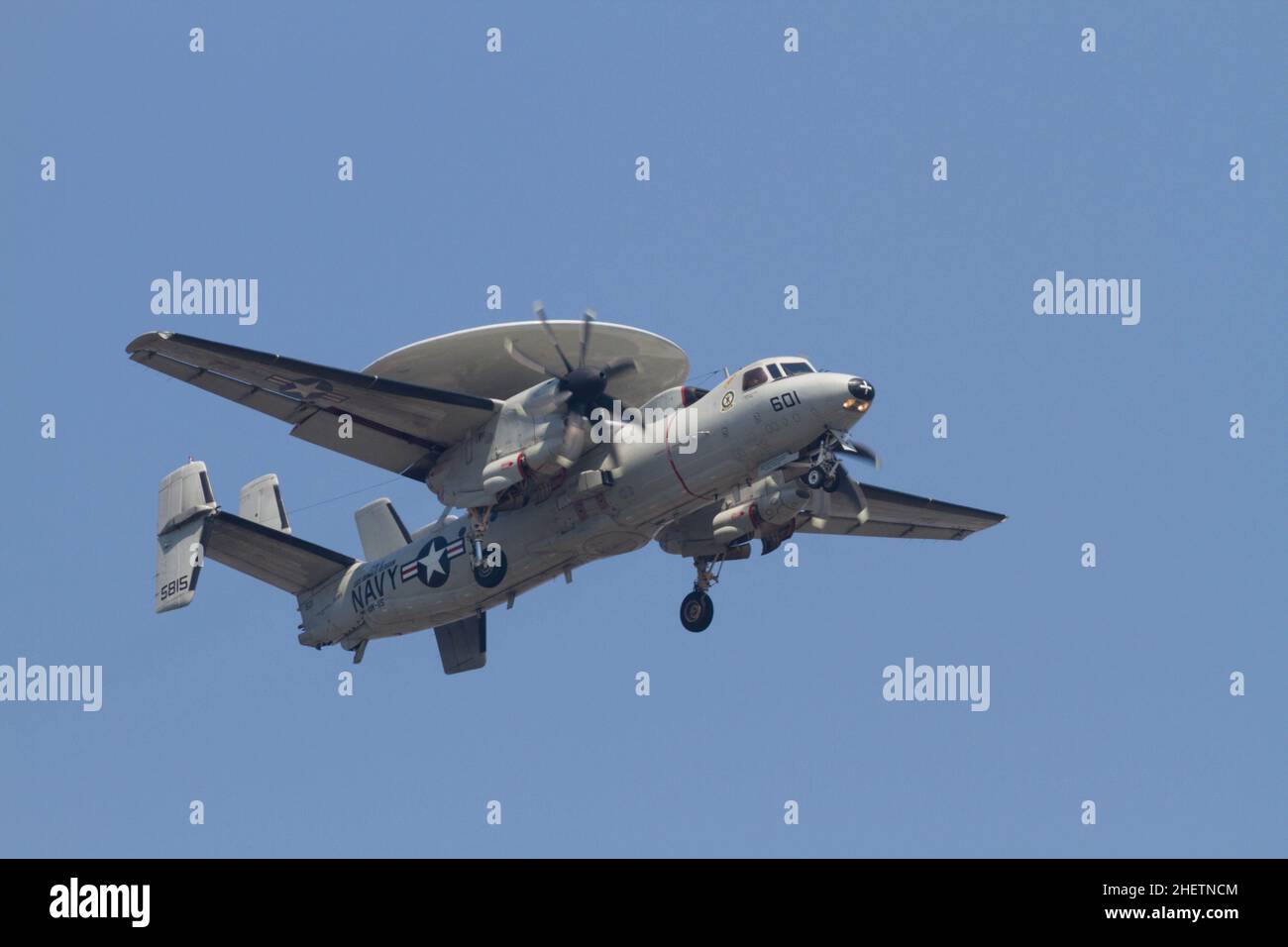 A Northrop Grumman E2 Hawkeye, early warning aircraft with Carrier Airborne Early Warning Squadron 115 (VAW-115), also known as the 'Liberty Bells' flying near Naval Air Facility, Atsugi airbase in Kanagawa, Japan. Stock Photo
