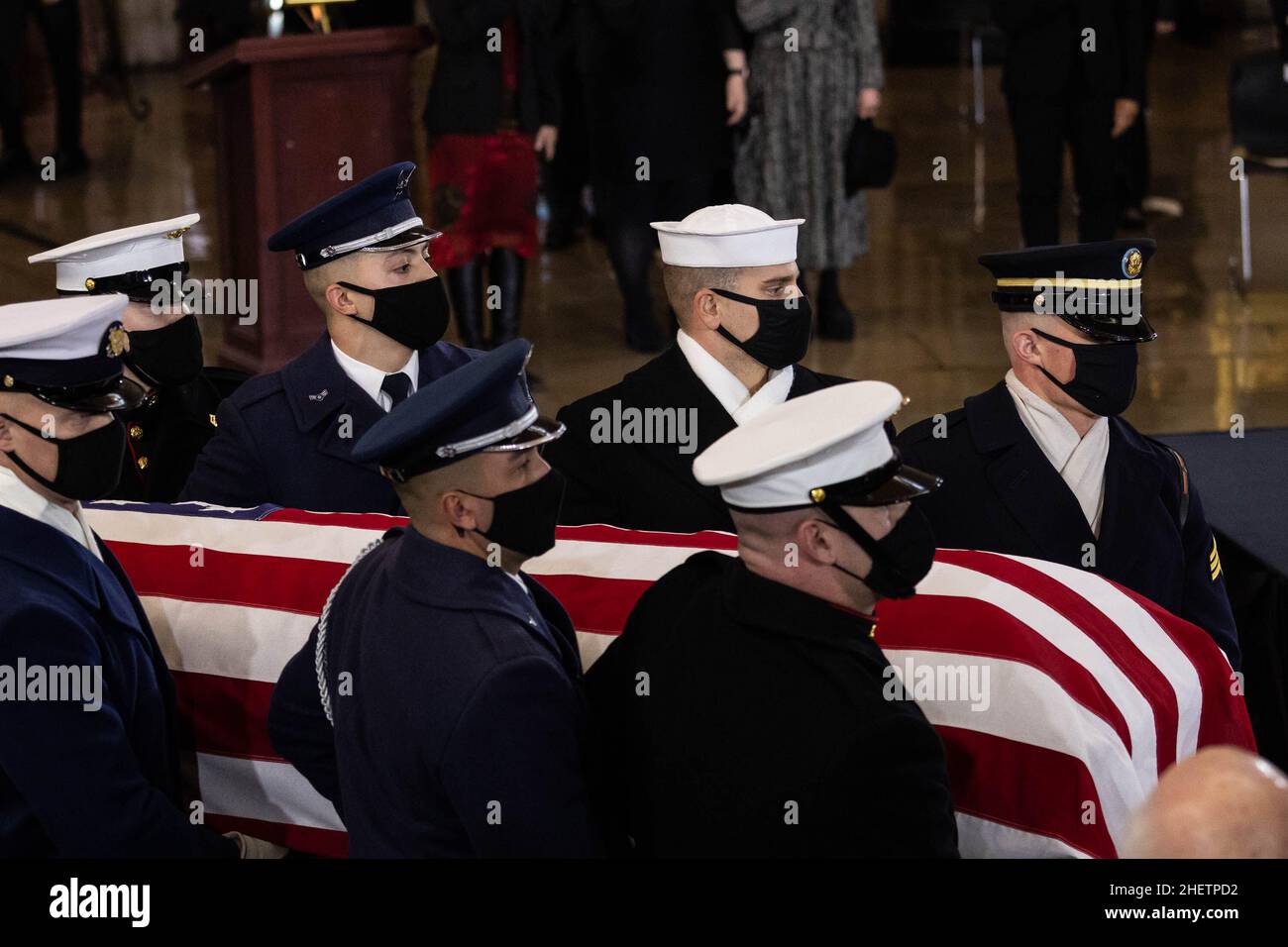 A U.S. Joint Forces bearer team carries the flag-draped casket of former Senate Majority Leader Harry Reid, D-NV, inside the U.S. Capitol where he will lie in state, Wednesday, Jan. 12, 2022, in Washington. Reid, who served five terms in the Senate, will be honored Wednesday in the Capitol Rotunda during a ceremony closed to the public under COVID-19 protocols.Credit: Graeme Jennings/Pool via CNP /MediaPunch Stock Photo