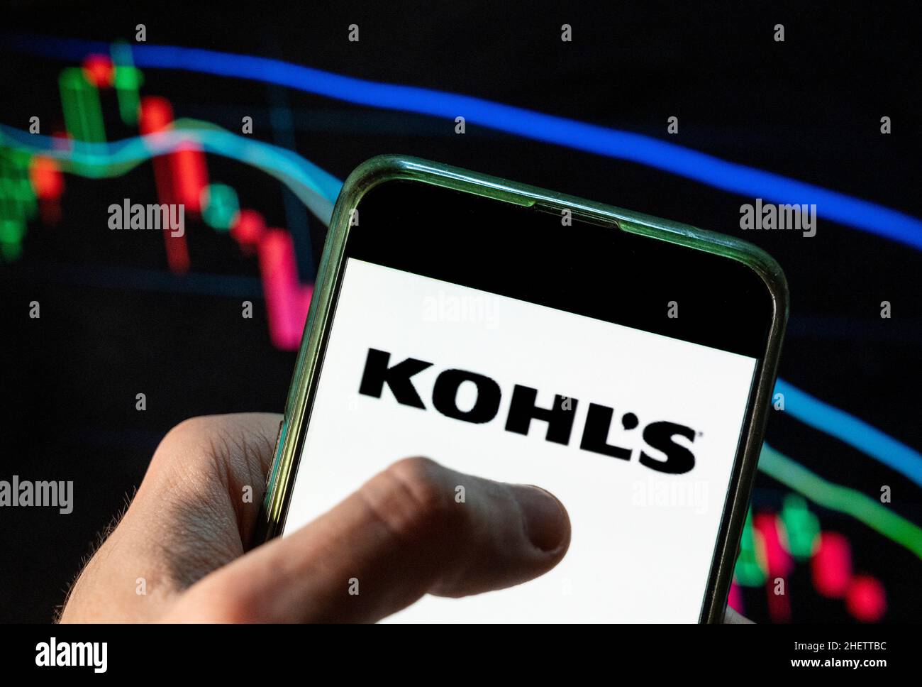 China. 4th Dec, 2021. In this photo illustration the American department store retailing chain company Kohl's logo seen displayed on a smartphone with an economic stock exchange index graph in the background. (Credit Image: © Budrul Chukrut/SOPA Images via ZUMA Press Wire) Stock Photo