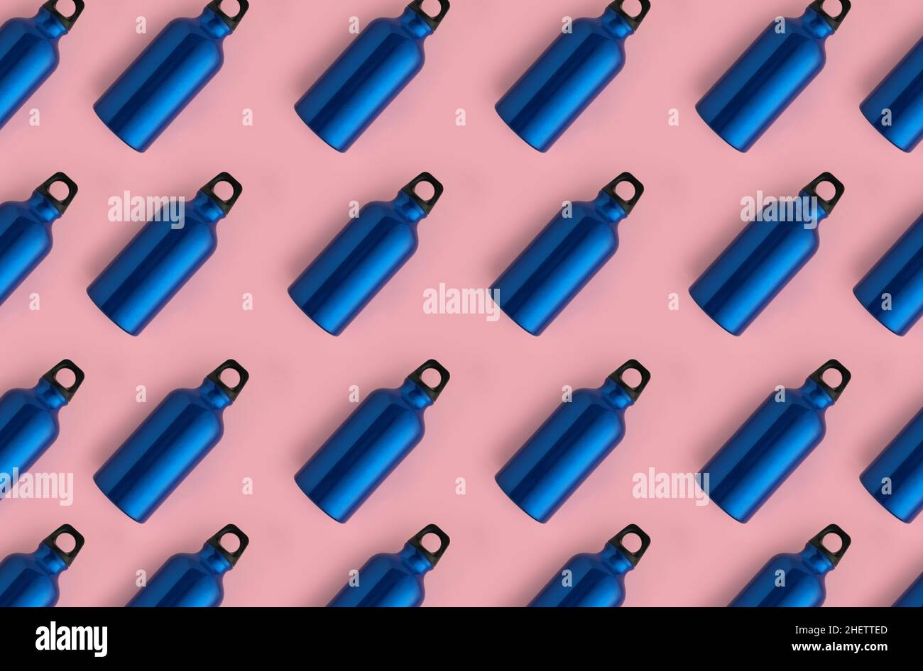 Seamless pattern of blue steel water bottles on pink background Stock Photo