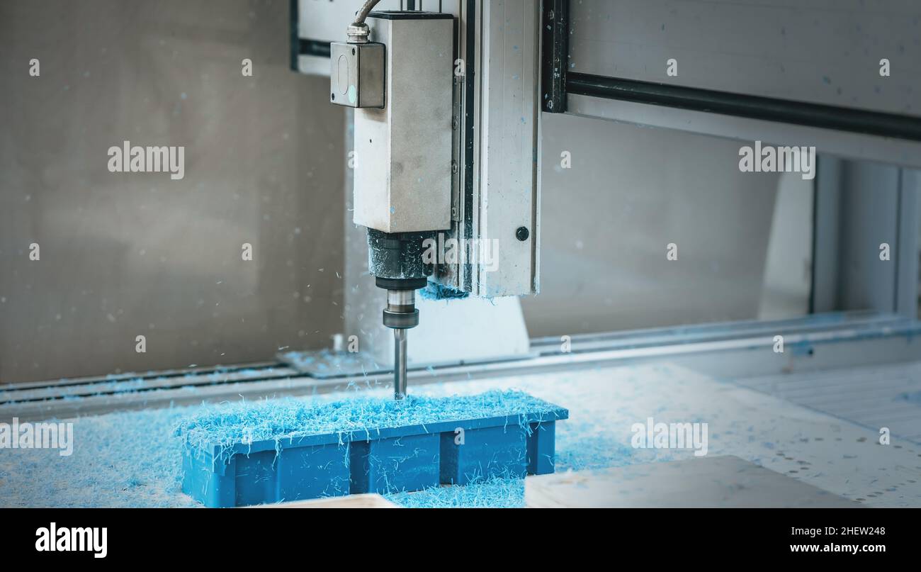 CNC drilling and milling machine in industrial factory. Stock Photo