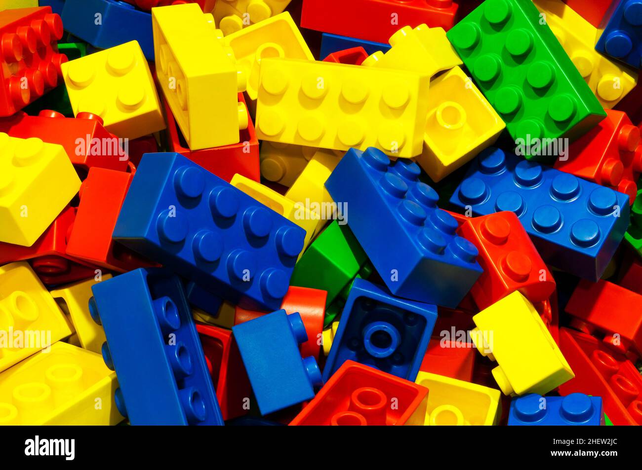 a lot of unsorted colored bricks Stock Photo