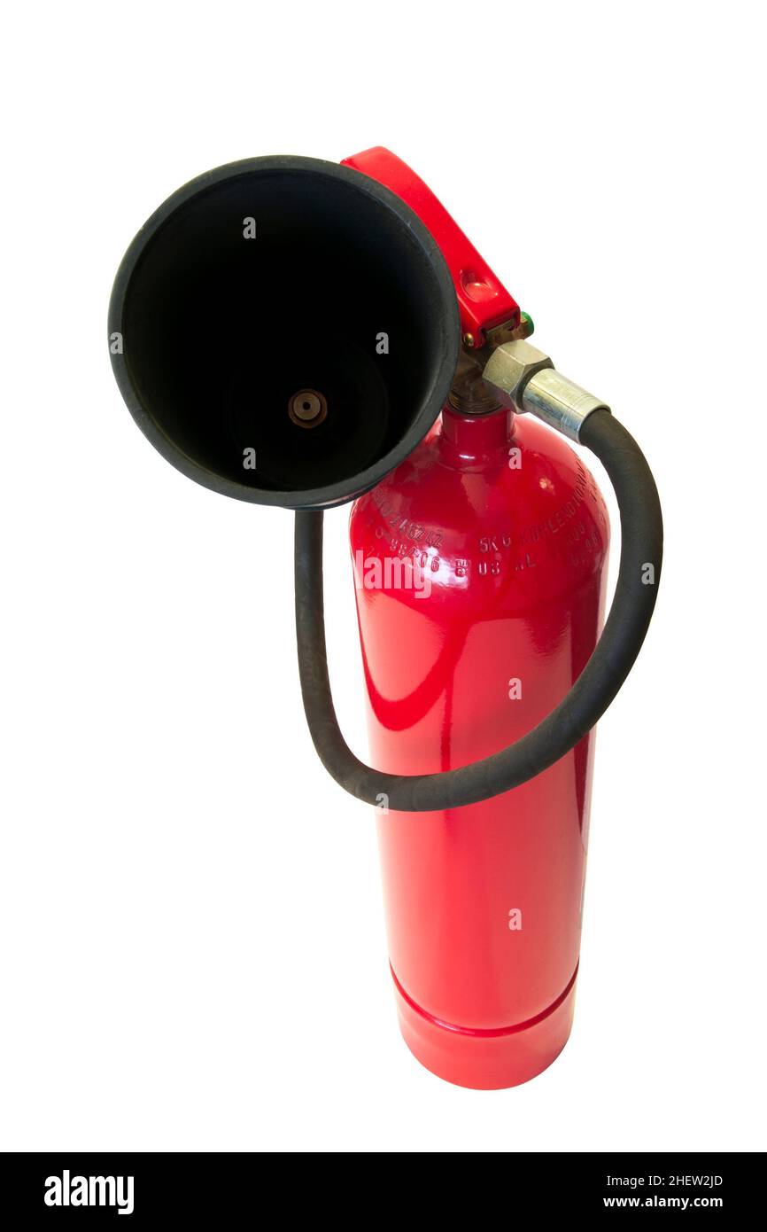 red fire extinguisher with black pipe isolated on white background Stock Photo