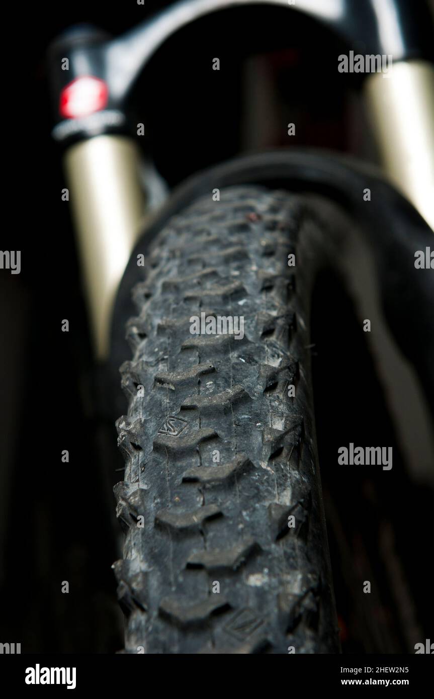 black pattern with suspension fork on black background for rough underground Stock Photo