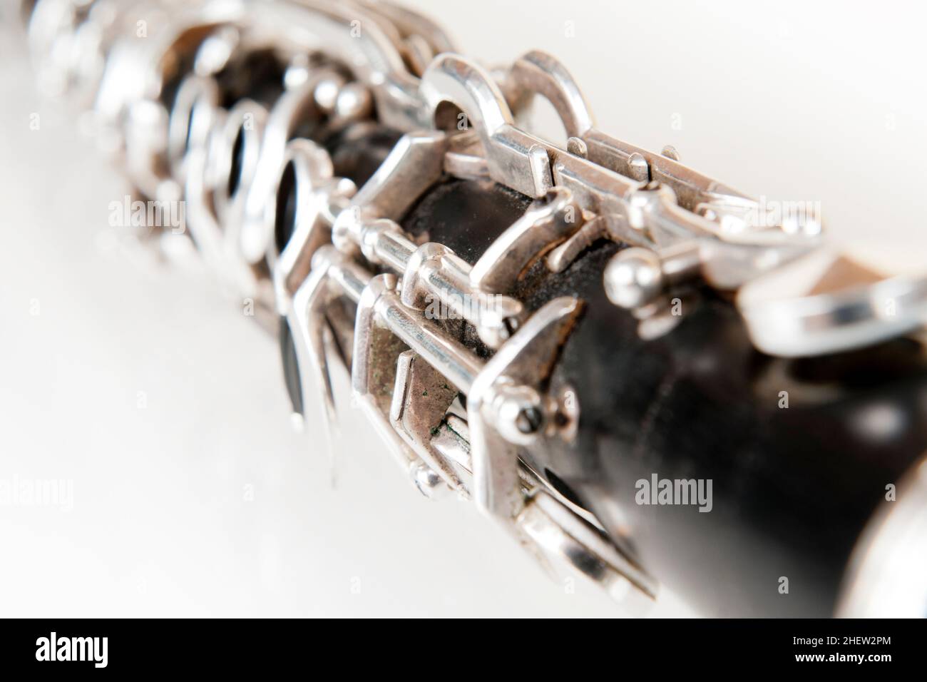 black music clarinet decorated with silver metal on white background Stock Photo