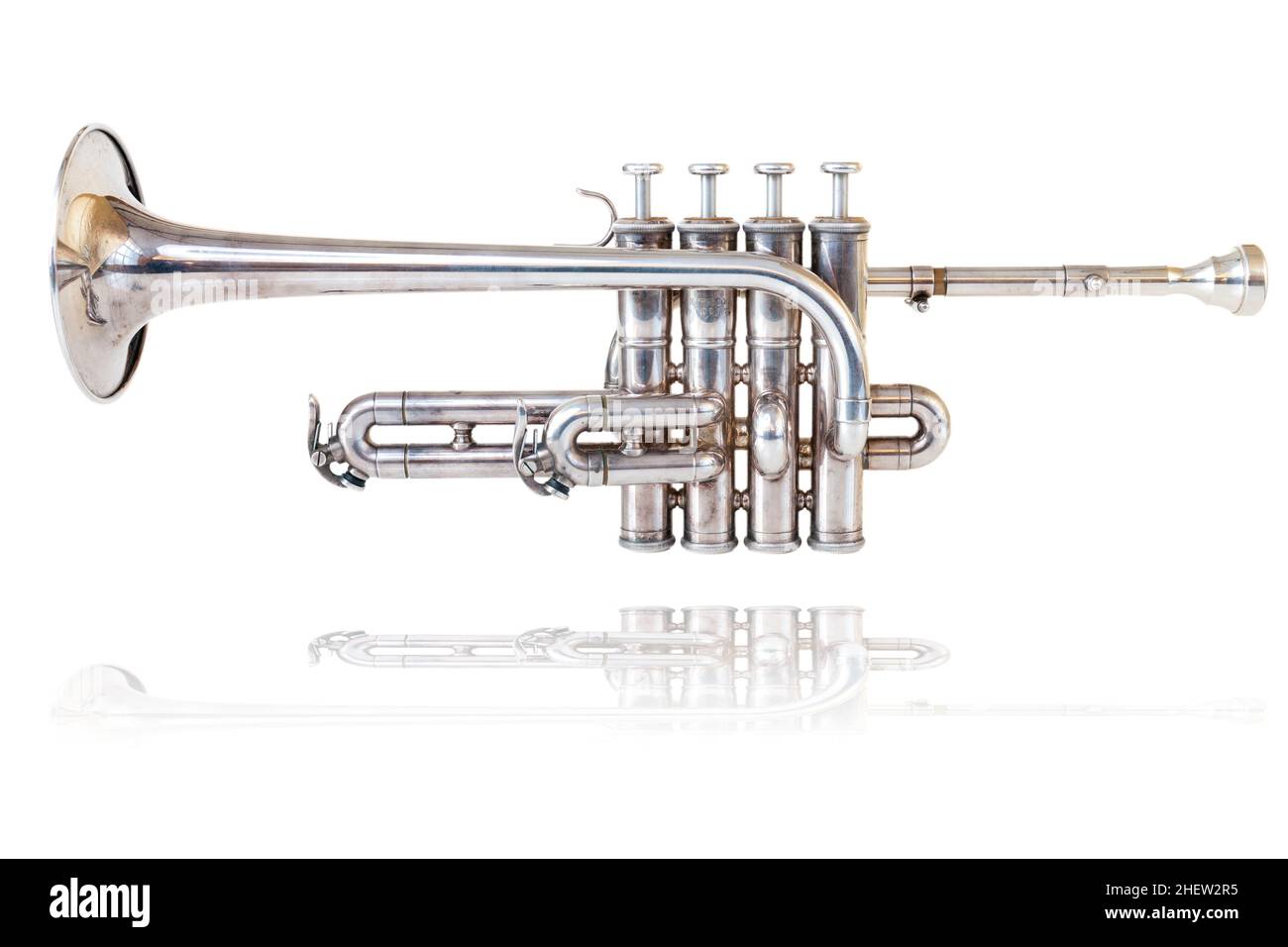 Silver golden piccolo trumpet four valves isolated background Stock