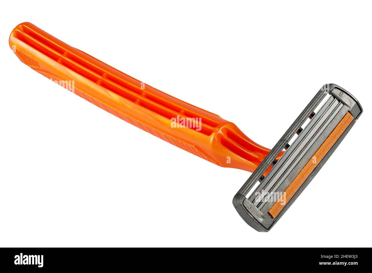 orange single-use shaver lying on the back Stock Photo