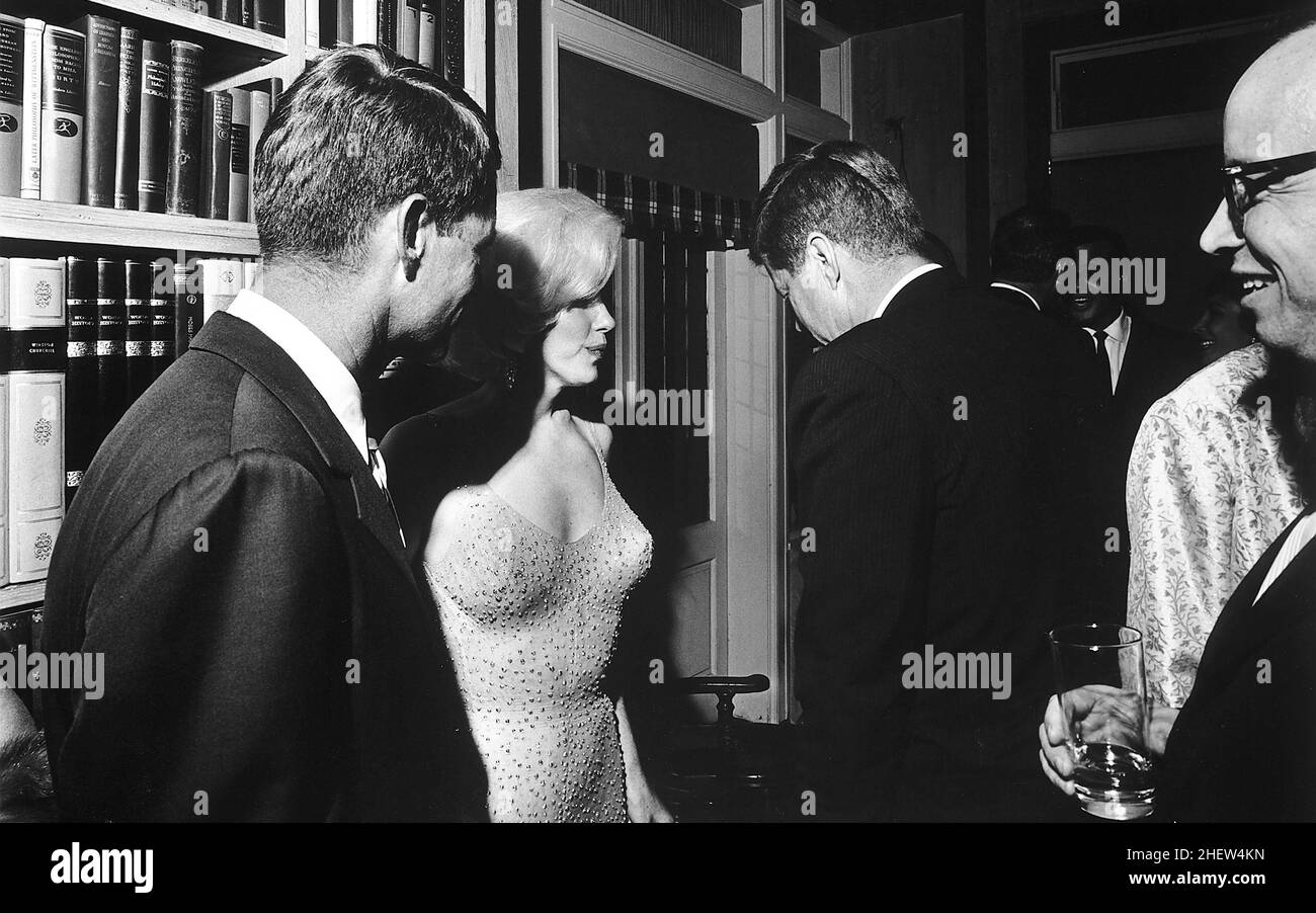 John F Kennedy (JFK) and Marilyn Monroe at a party at Madison Square Garden 1962 Stock Photo