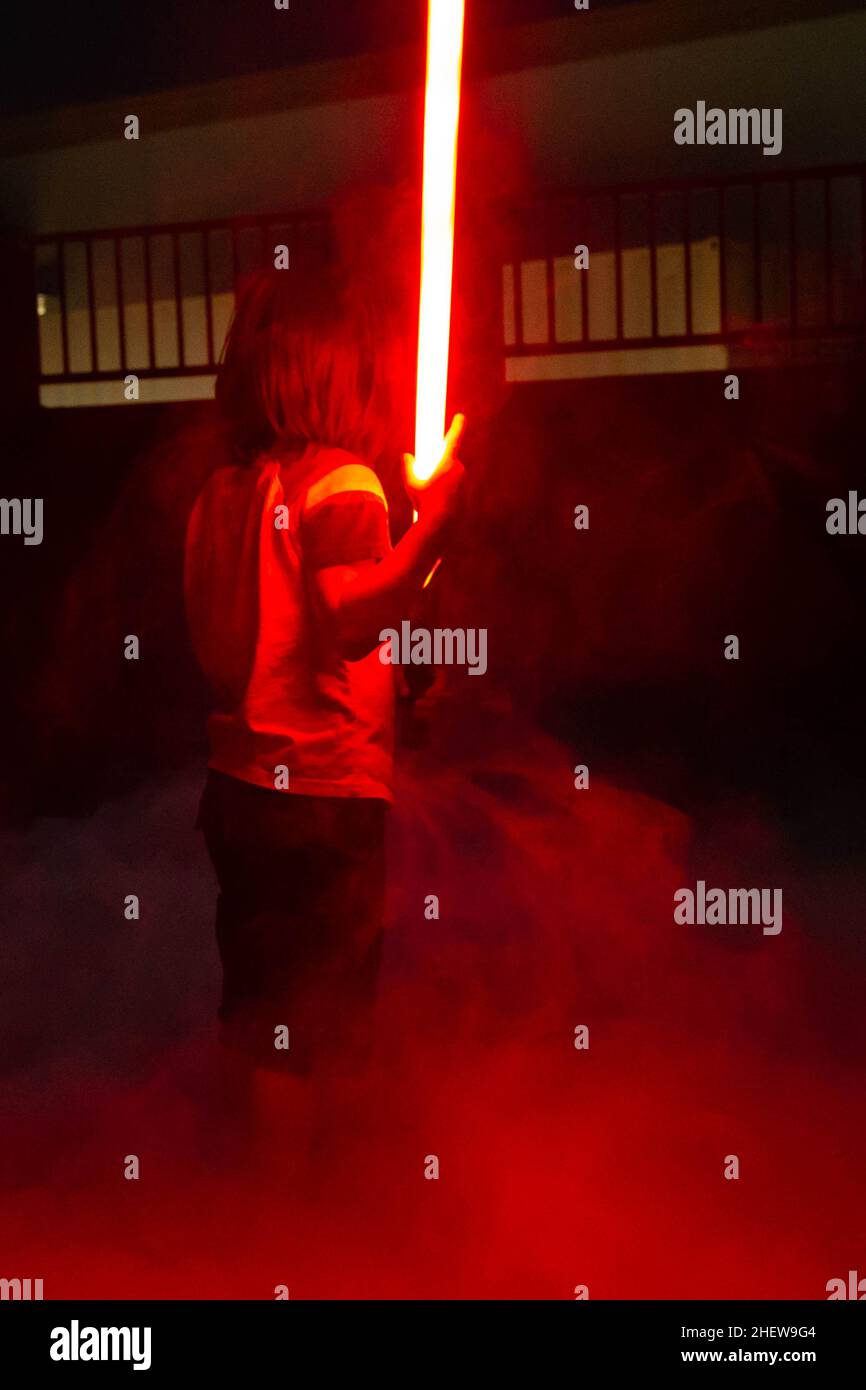 5 Year Old Boy Playing Outside With Lightsabers Stock Photo Alamy 5-year-old-boy-playing-outside-with-lightsabers-stock-photo-alamy