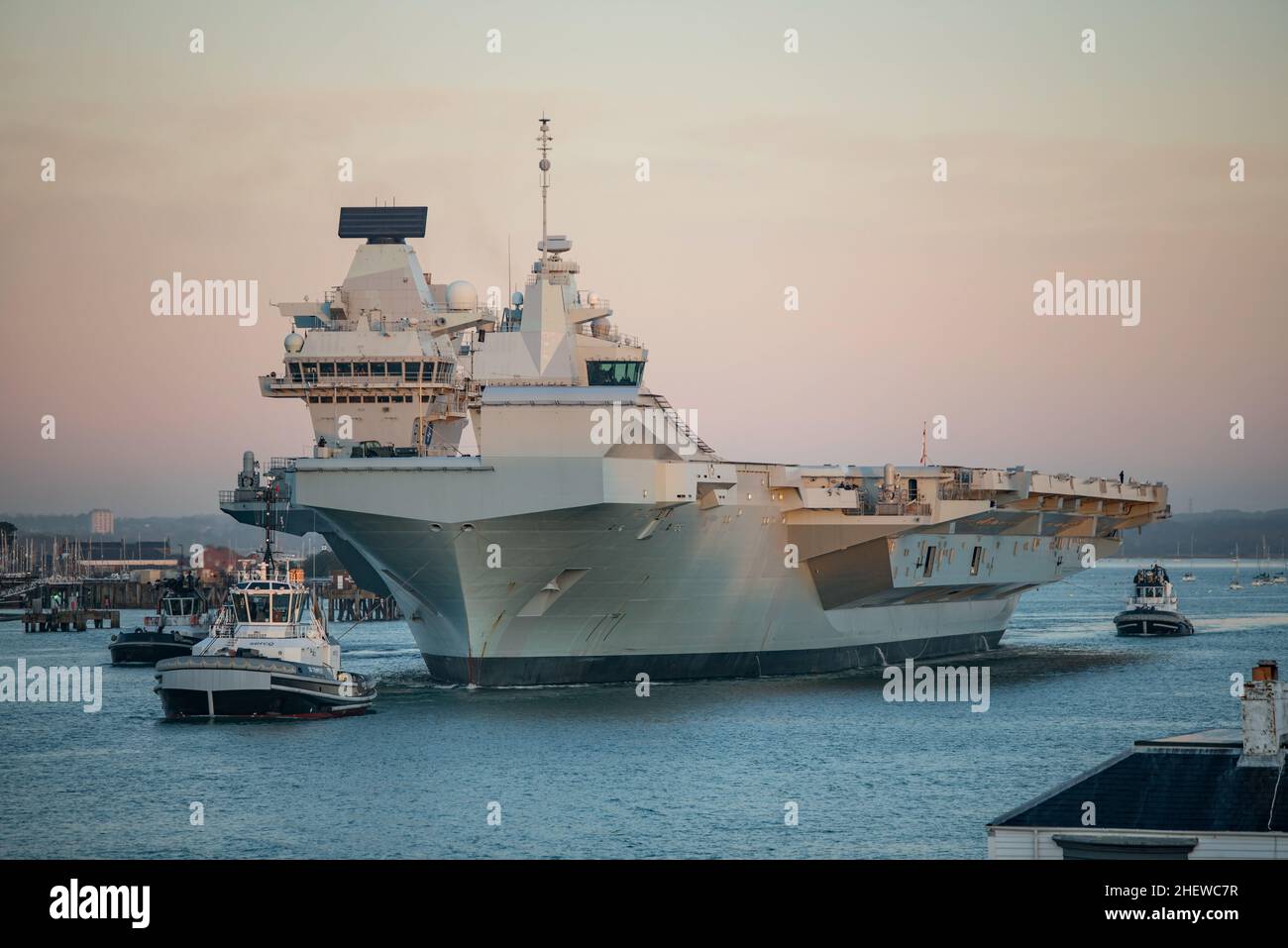 Royal Navy warship HMS Prince of Wales (R09) left Portsmouth Harbour, UK at sunrise on 12/1/22 to take over as flagship of the NATO Response Force. Stock Photo