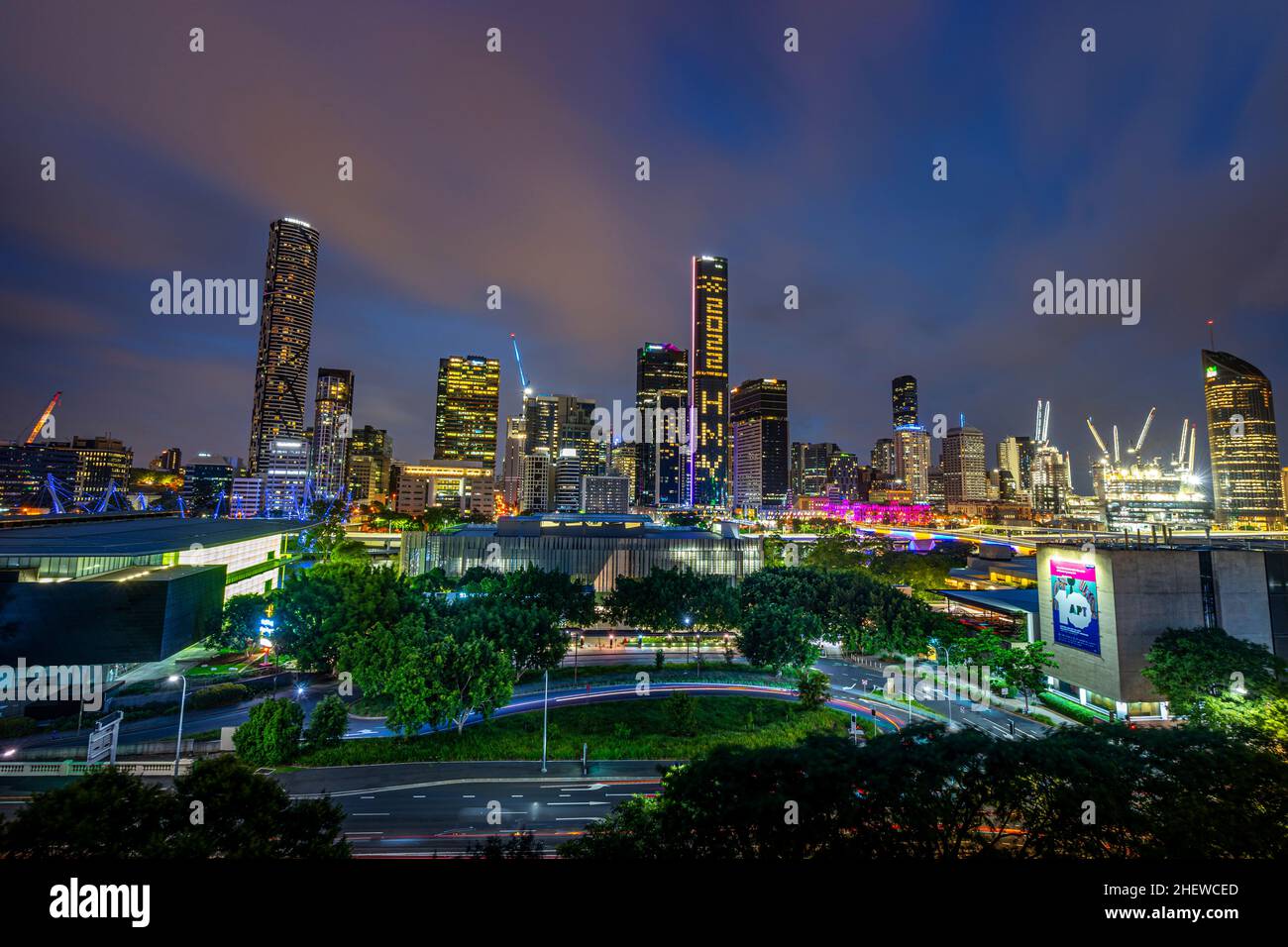 Brisbane CBD skyline at night seen from Southbank of Brisbane River Stock Photo