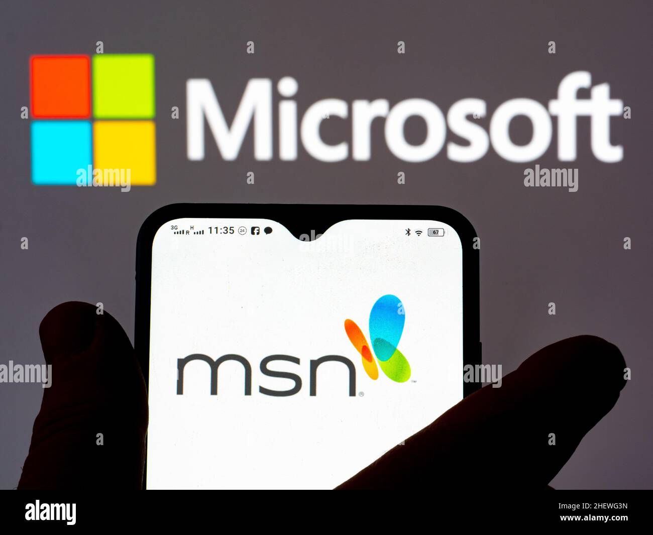 Ukraine. 12th Jan, 2022. In this photo illustration, the MSN (Microsoft news) logo is seen displayed on a smartphone and Microsoft logo in the background. Credit: SOPA Images Limited/Alamy Live News Stock Photo
