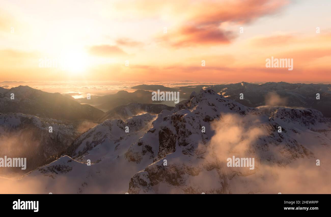 Aerial Panoramic View of Canadian Mountain covered in snow Stock Photo ...