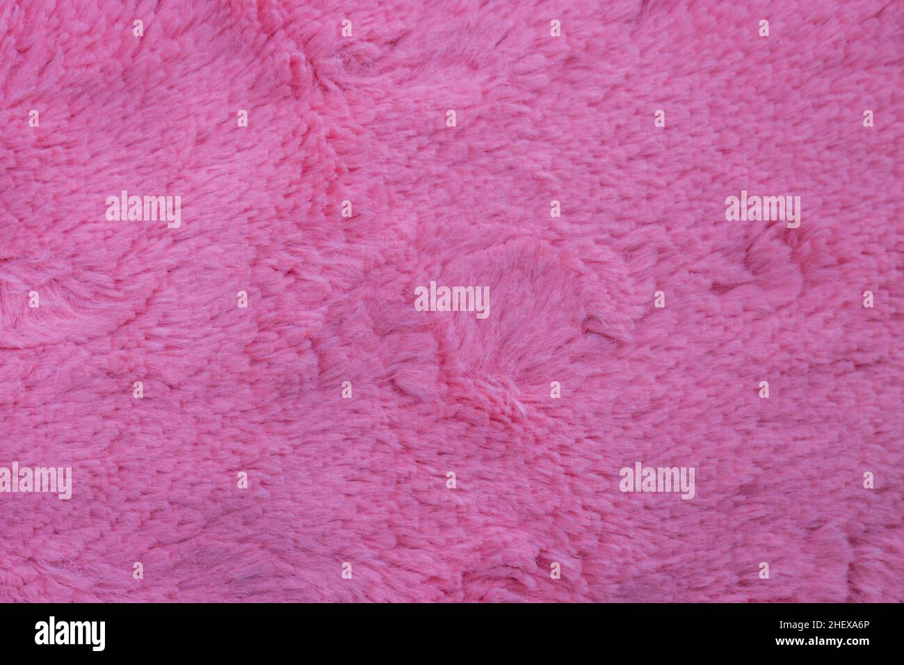 Beautiful sparkling artificial pink fur texture background Stock Photo