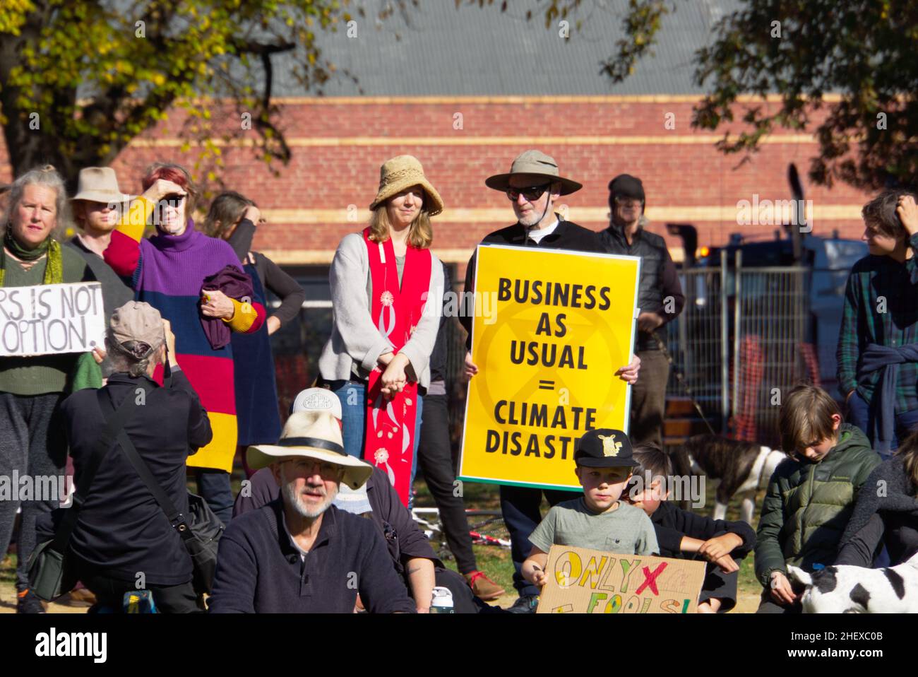 Climate change protest sign and people demonstration rally for saving the environment, Castlemaine, Victoria, Australia. Stock Photo