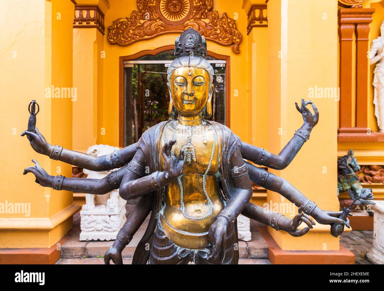 Ancient statue of Guanyin, Guan Yin or Kuan Yin. It is the Buddhist bodhisattva associated with compassion Stock Photo