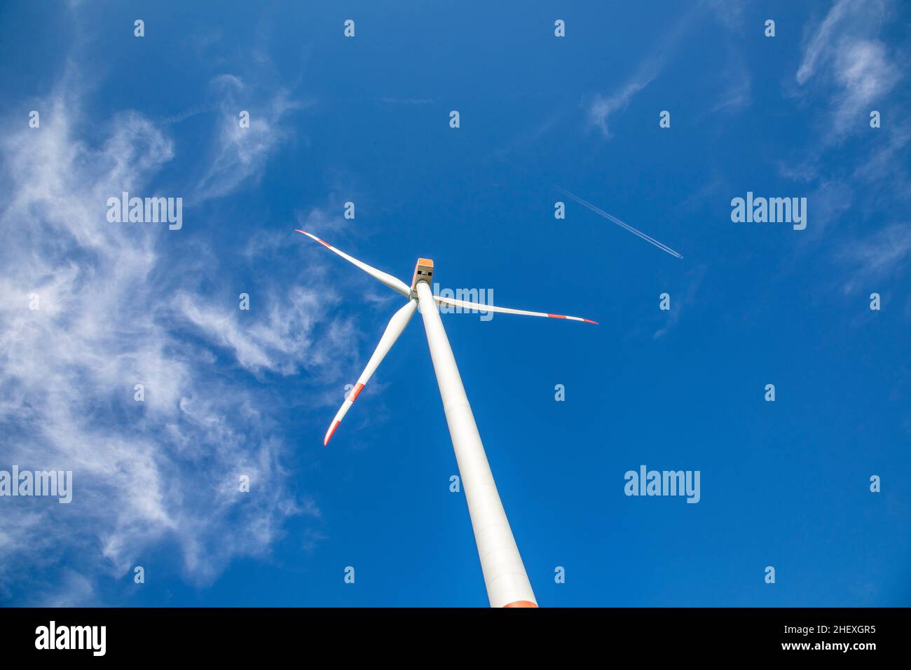 wind turbine under clear blue sky Stock Photo - Alamy
