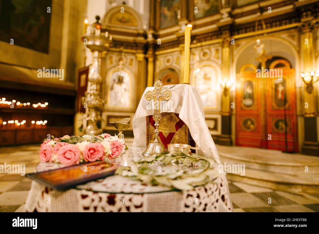 Table with a crucifix in front of the altar in the Church of St. Sava in Tivat. Montenegro Stock Photo