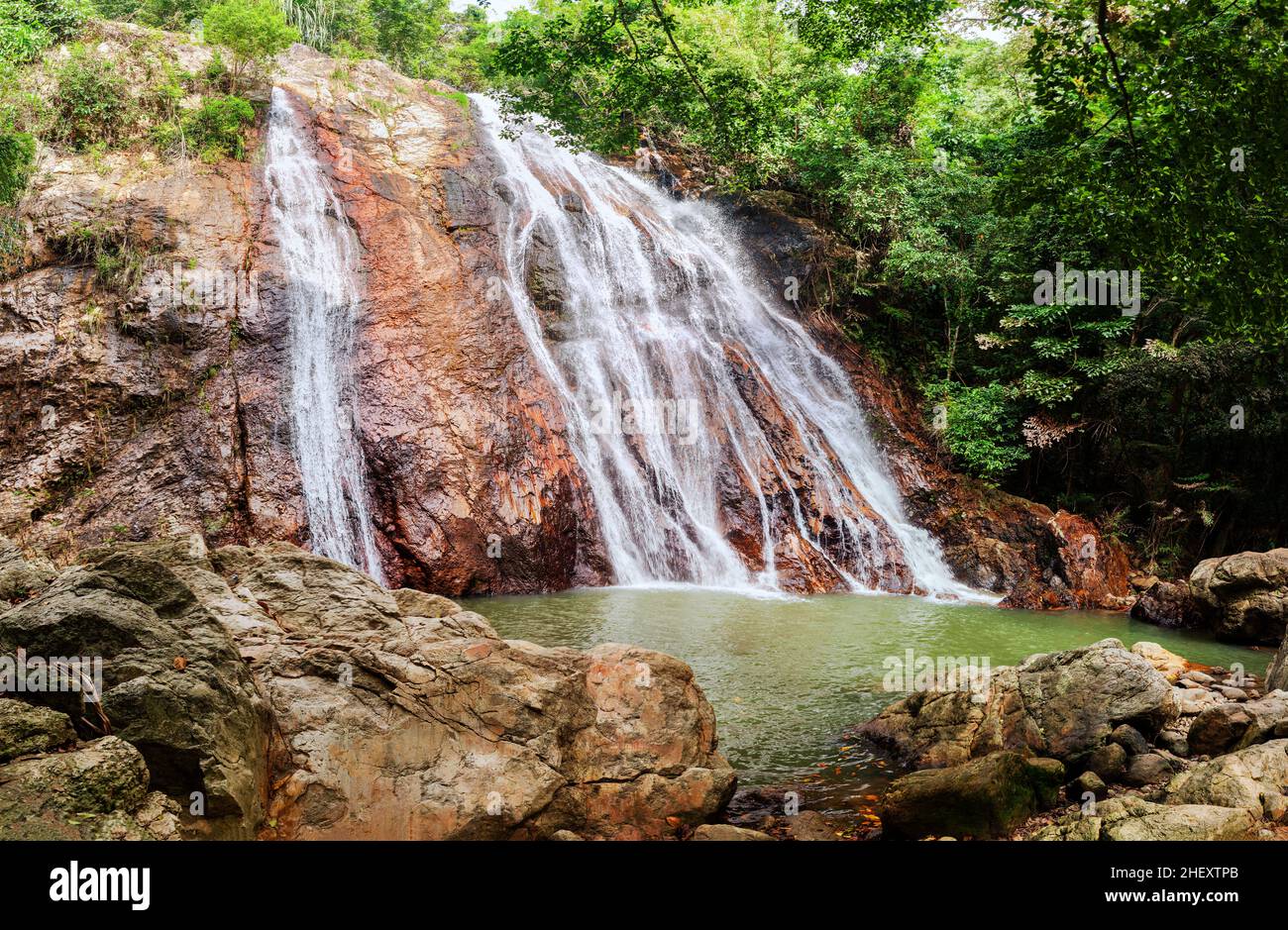 Na Muang Waterfall Koh Samui Island Thailand, Namuang Waterfall, falling water stream, mountain rocks landscape, tropical jungle forest,  travel Stock Photo