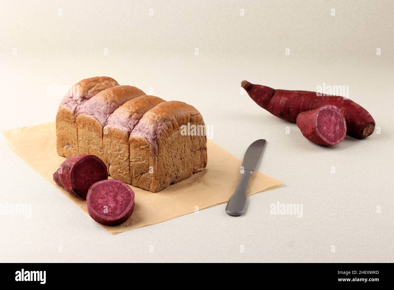 Loaf Purple Sweet Potato Japanese Shokupan, Organic Natural Color from Sweet Potato. Bread made of Flour, Yeast, Milk, Butter, Salt and Sugar Stock Photo