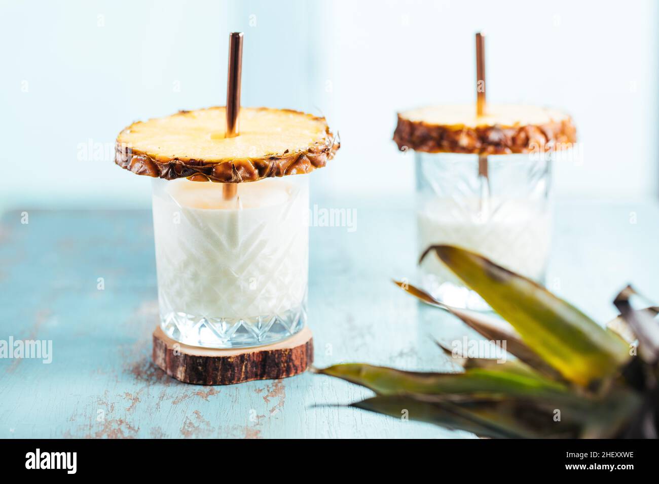 Pina colada cocktail creative decorated with pineapple Stock Photo