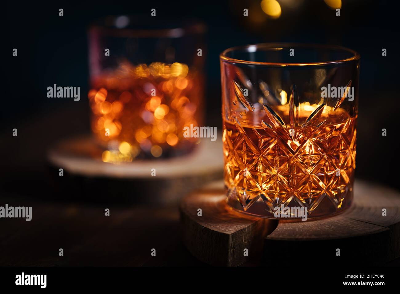 Two glasses of whiskey in a moody dark atmosphere Stock Photo Alamy