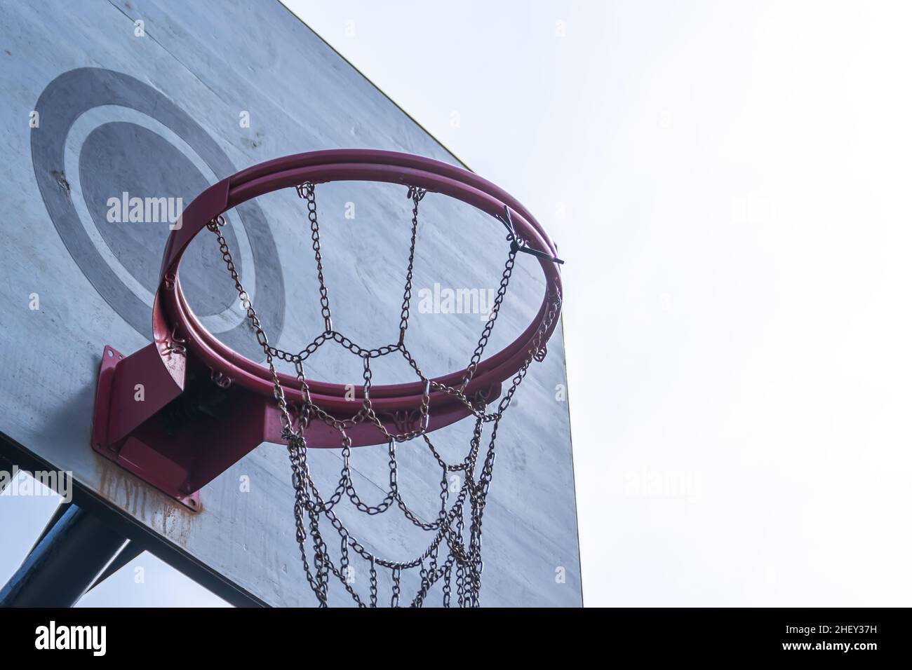 Low angle view of basketball hoop under the morning sunlight Stock Photo