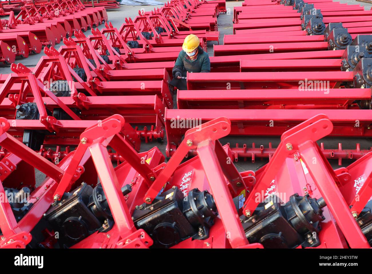 Lianyungang, Lianyungang, China. 13th Jan, 2022. On January 13, 2022, workers in a rotary cultivator production enterprise in Guanyun Economic Development Zone, Lianyungang City, Jiangsu Province were testing the rotary cultivators that were about to leave the factory.At the beginning of the new year, the sales of agricultural rotary tillers in Guanyun County, Lianyungang City, Jiangsu Province soared, and all rotary tiller manufacturers worked overtime to produce orders. In recent years, Guanyun county has developed more than 40 varieties of nine series of agricultural rotary cultivator Stock Photo
